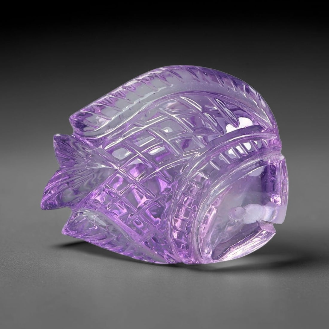 30.96ct Natural Amethyst Fish Carved Loose Gemstone, 53TY: Natural amethyst hand carved fish loose gemstone, measuring 24.2x20.1x11.1mm. Transparent purple hue with detailed polished carving. Great for unique pendant design, gemstone display and collection, s