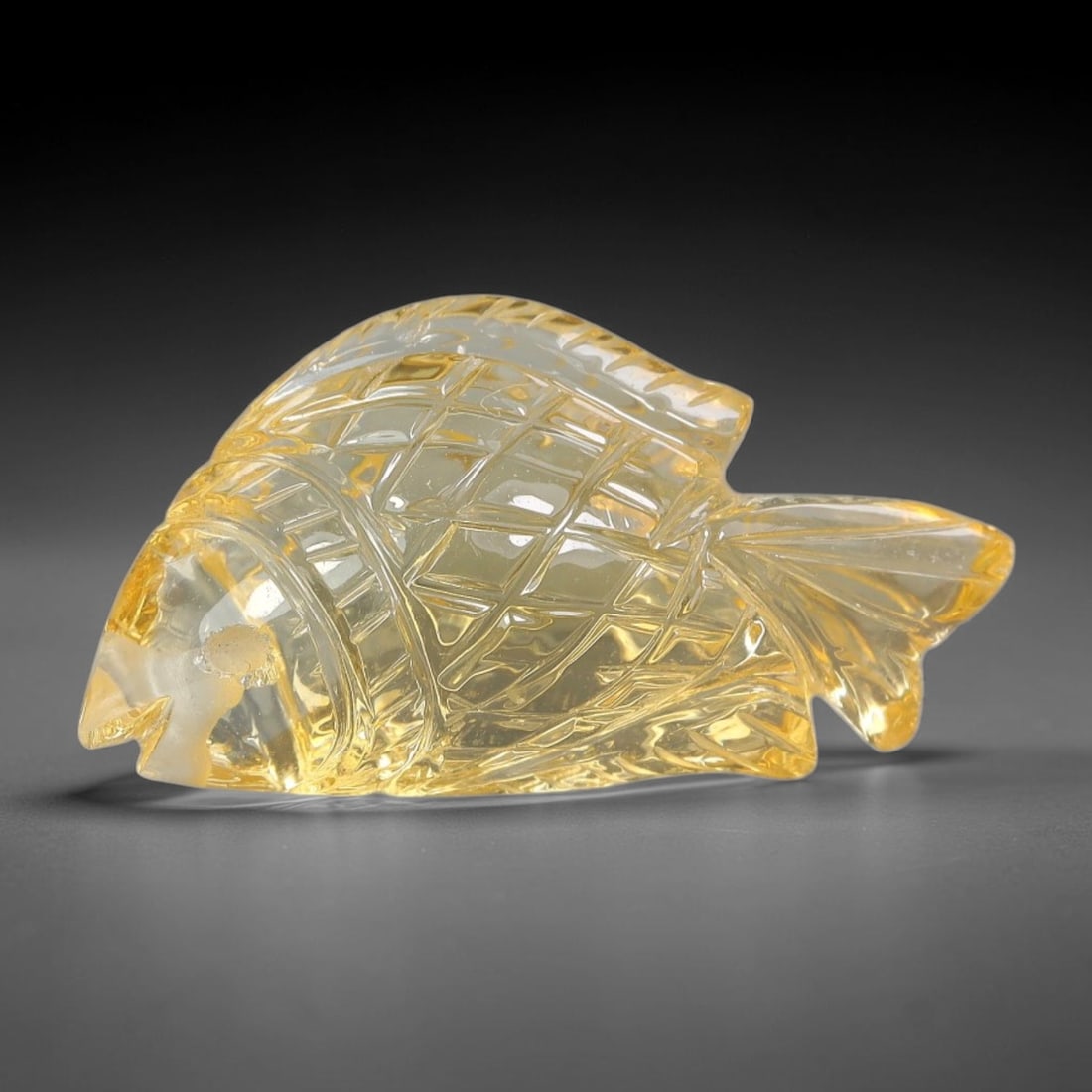 24.68ct Natural Citrine Fish Carved Loose Gemstone, 52TY: Natural citrine hand carved fish loose gemstone, measuring 29.5x14.6x11.1mm. Warm golden yellow hue with intricate polished fish carving. Excellent for custom pendant creation, gemstone display and co