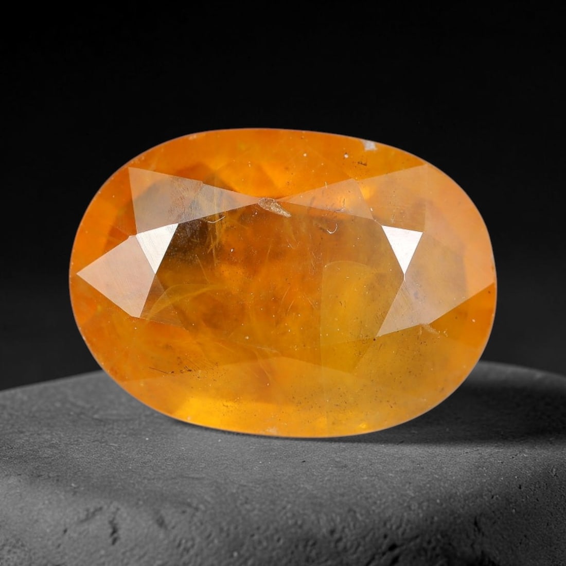 3.87 Carats Natural Yellow Sapphire Oval Faceted Loose Gemstone, 40TT: This natural yellow sapphire features a classic oval brilliant faceted cut, holding consistent warm golden-yellow color throughout the corundum crystal. Fine microscopic mineral specks and faint natur