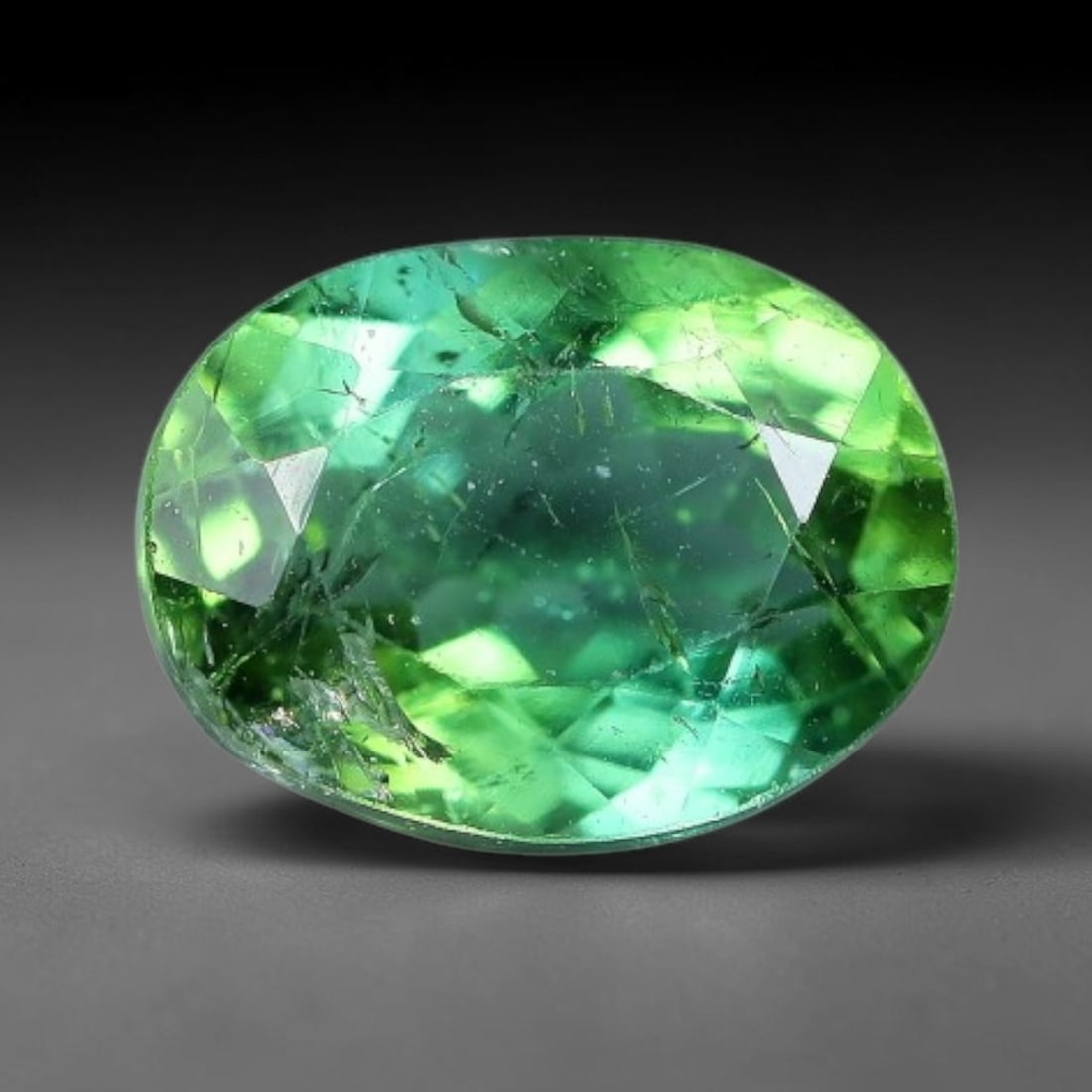 1.35ct Natural Green Tourmaline Oval Cut Loose Gemstone, 36TY: Natural green tourmaline oval faceted loose gemstone, measuring 7.6x5.7x4.1mm. Vibrant green tone with crisp faceting producing attractive sparkle. Ideal for custom ring and pendant settings, perfect 