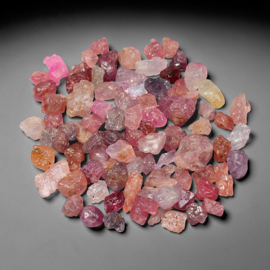 123.55ct Natural Multi-Colour Spinel Rough Parcel Loose Gemstone, 85TV: Natural spinel rough parcel showcasing a beautiful array of soft varied hues with subtle tonal differences throughout each crystal. Raw crystalline surfaces carry authentic natural mineral textures an
