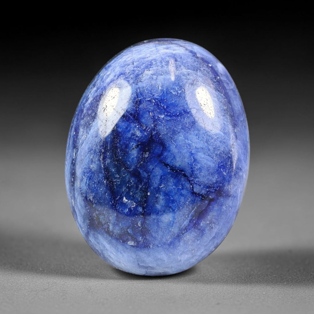 19.96 Carats Natural Madagascar Blue Sapphire Loose Gemstone, 62SA: This natural Madagascar blue sapphire has dimension measurements of 19.4x14.9x6.5mm, sourced from Madagascar's extensive corundum mineral deposits that consistently yield sought-after corundum specime