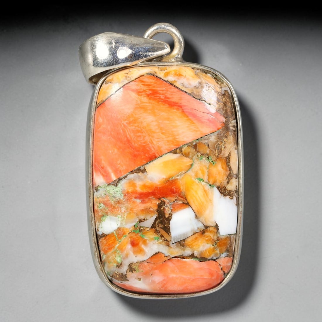Oyster Turquoise Pendant - 925 Silver Handmade Gemstone, 50TY: This specimen features natural oyster turquoise set within handcrafted sterling silver mount. The polished oval cabochon displays a matrix host with intergrown bright turquoise, orange spiny oyster sh