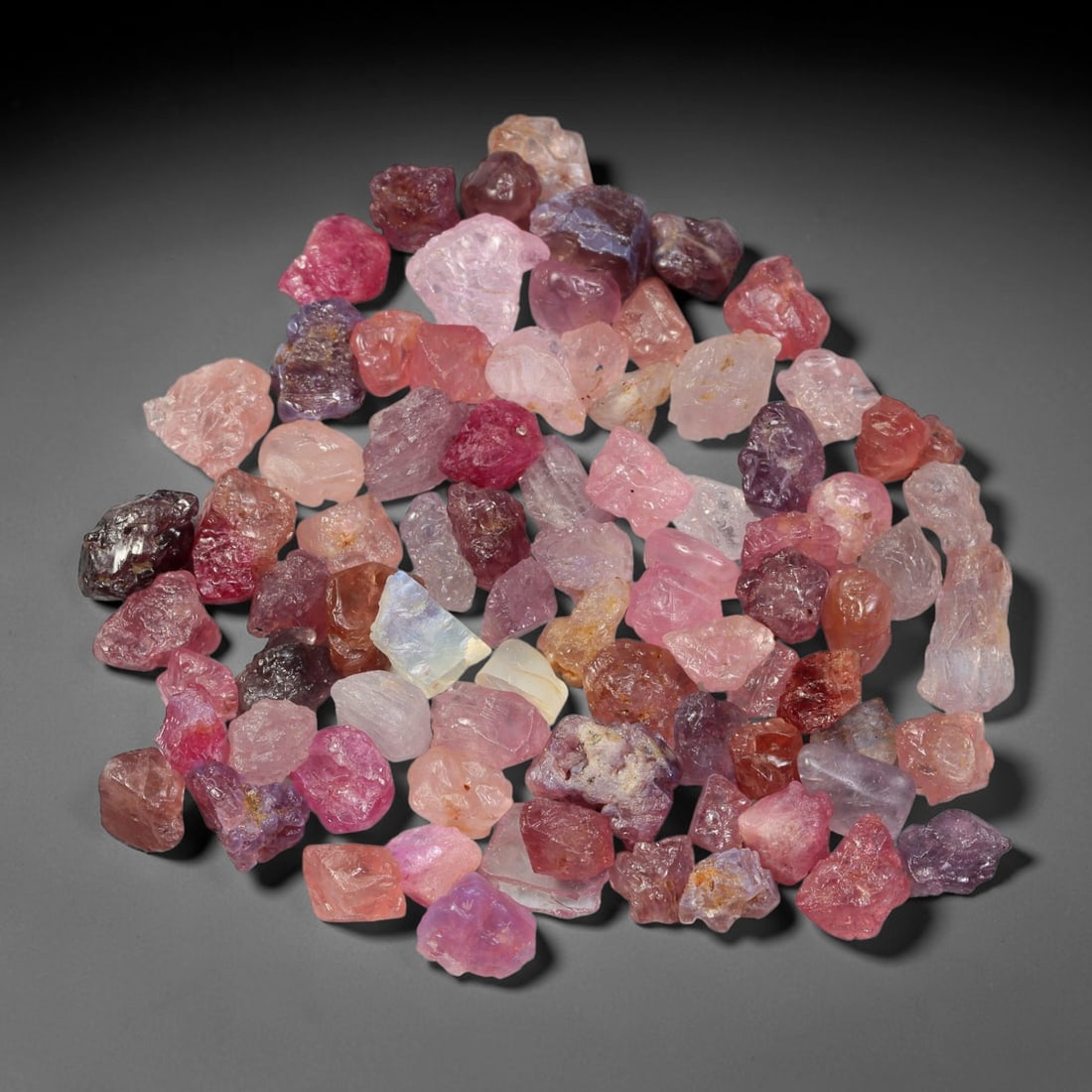 112.67ct Natural Multi-Colour Spinel Rough Parcel Loose Gemstone, 91TV: Natural spinel rough parcel showcasing a beautiful array of soft varied hues with subtle tonal differences throughout each crystal. Raw crystalline surfaces carry authentic natural mineral textures an