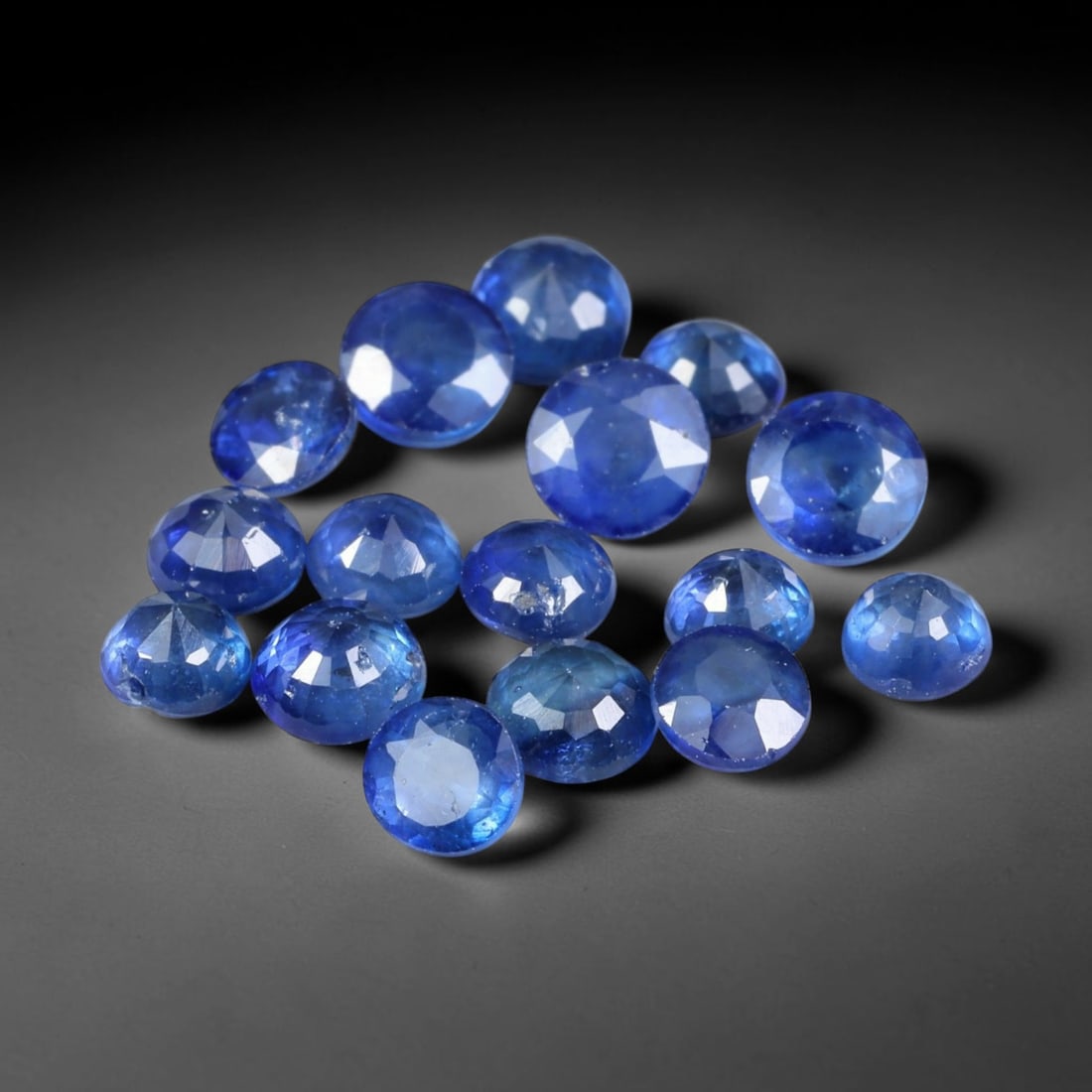 3.76ct Natural Blue Sapphire Round Cut Loose Gemstone Parcel, 15TZ: This parcel round faceted natural blue sapphires with each stone measuring 3.8x2.3mm. The gemstones show saturated deep blue colouration with natural mineral inclusions and subtle internal growth feat