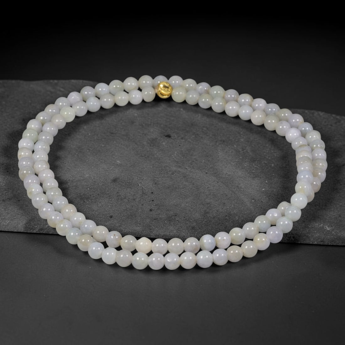 Natural Burmese Type A Pale Lavender Jadeite Jade Beaded Necklace, 23TF: This necklace features smoothly polished round natural Burmese Type A jadeite beads measuring 5.5mm, with soft pale lavender and milky white tones across the beads. It is completed with a polished gol