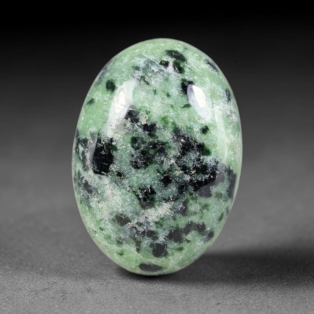 31.77ct Natural Ruby Zoisite Cabochon Loose Gemstone, 22TY: Natural ruby zoisite cabochon cut, dimensions 26.3x18.9x6.7mm. Rich magenta and deep purple swirling colour pattern with natural mineral veining across the polished surface. Smooth polished cabochon f