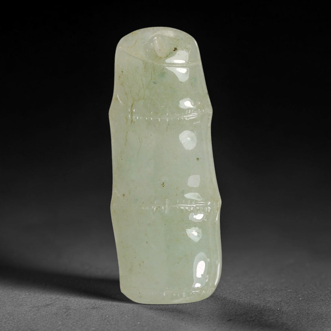 Natural Burmese Type A Jadeite Jade Hand Carved Pendant, 22TS: Artisan hand-carved untreated Burmese Type A jadeite jade pendant measuring 34.6x13.9 mm. Carefully sculpted with detailed relief craftsmanship and finished with a smooth glossy polish. Authentic Type