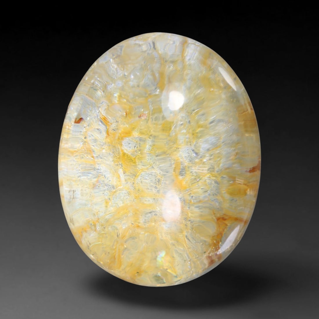53.00ct Natural Brazilian Phantom Quartz Oval Cabochon Loose Gemstone, 52YX: This smoothly polished cabochon of natural phantom quartz preserves delicate layered phantom crystal formations enclosed inside transparent quartz host. The domed polished surface offers unobstructed 