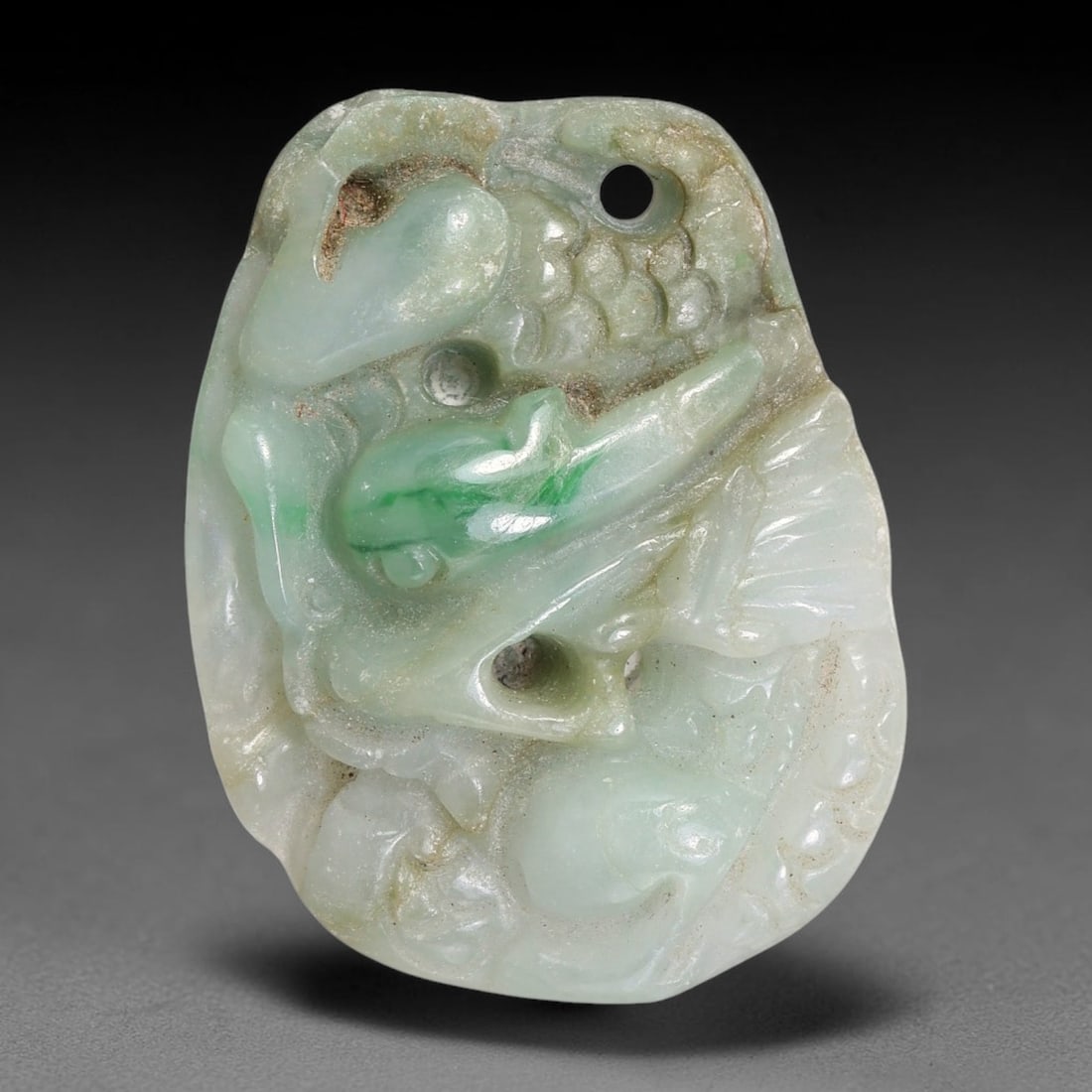 Natural Burmese Type A Jadeite Jade Hand Carved Pendant, 32TS: Artisan hand-carved untreated Burmese Type A jadeite jade pendant measuring 30.0x23.4 mm. Carefully sculpted with detailed relief craftsmanship and finished with a smooth glossy polish. Authentic Type