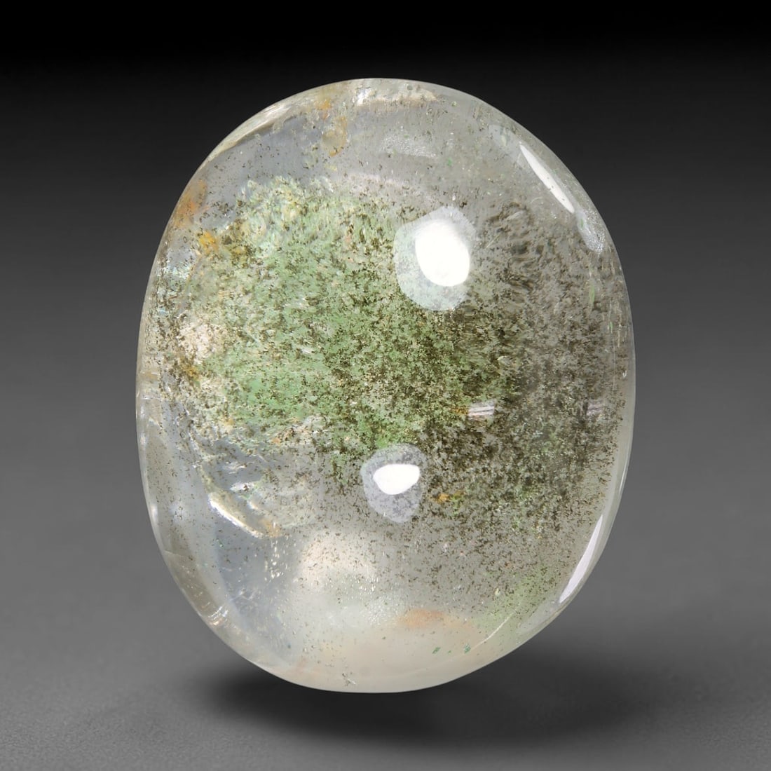 36.54ct Natural Brazilian Phantom Quartz Oval Cabochon Loose Gemstone, 58YX: This smoothly polished cabochon of natural phantom quartz preserves delicate layered phantom crystal formations enclosed inside transparent quartz host. The domed polished surface offers unobstructed 