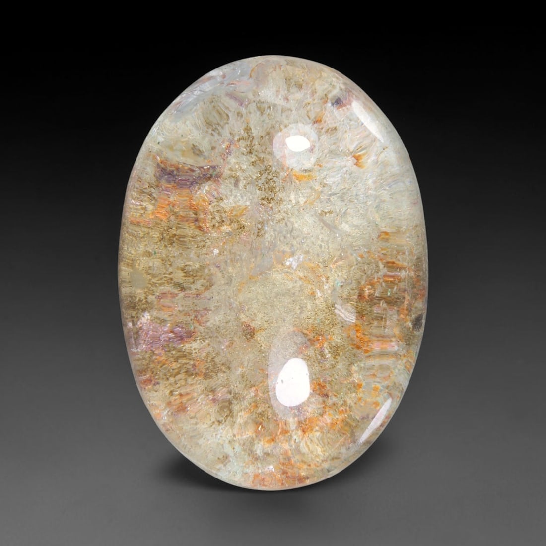 33.80ct Natural Brazilian Phantom Quartz Oval Cabochon Loose Gemstone, 26YX: This smoothly polished cabochon of natural phantom quartz preserves delicate layered phantom crystal formations enclosed inside transparent quartz host. The domed polished surface offers unobstructed 