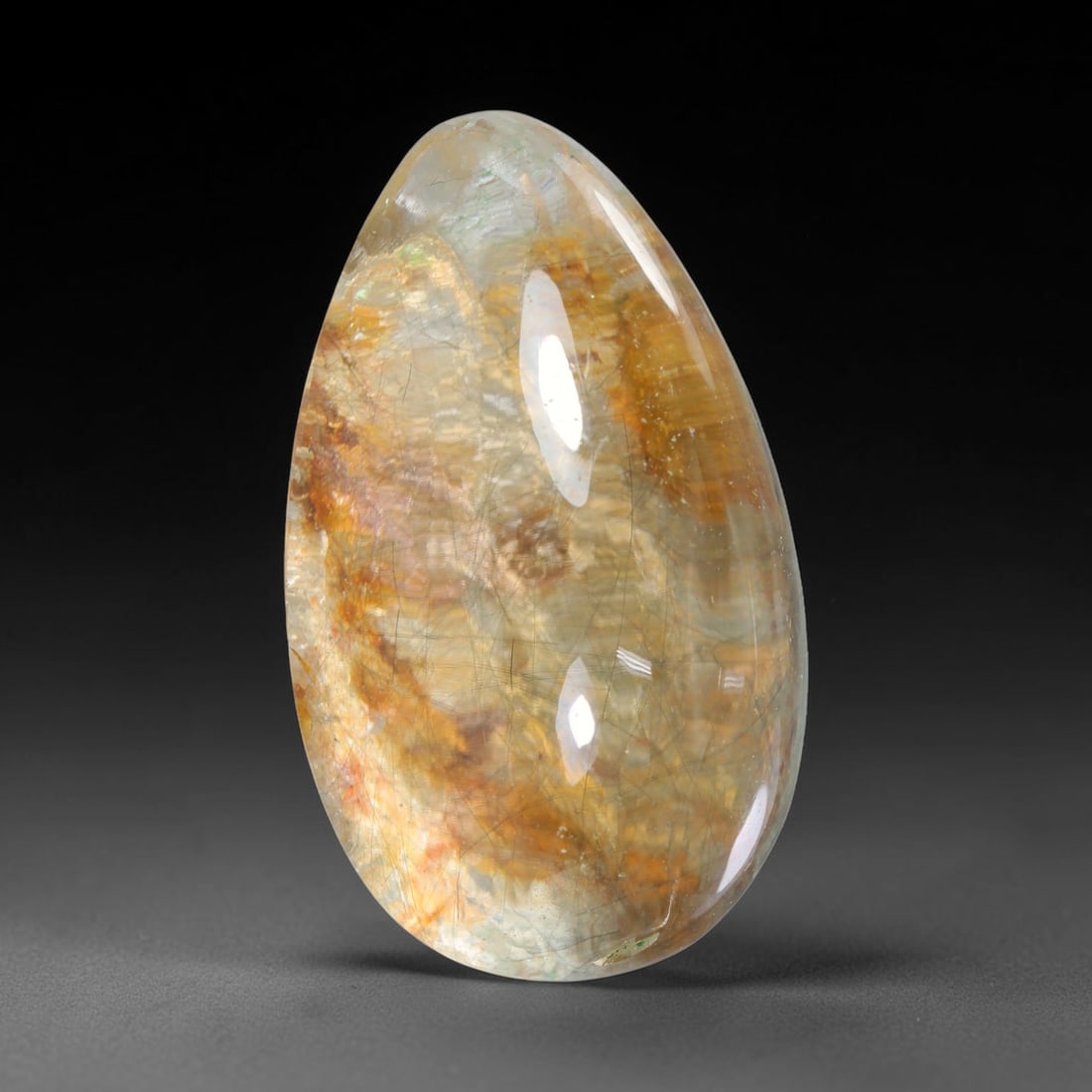 34.19ct Natural Brazilian Phantom Quartz Oval Cabochon Loose Gemstone, 23YX: This smoothly polished cabochon of natural phantom quartz preserves delicate layered phantom crystal formations enclosed inside transparent quartz host. The domed polished surface offers unobstructed 