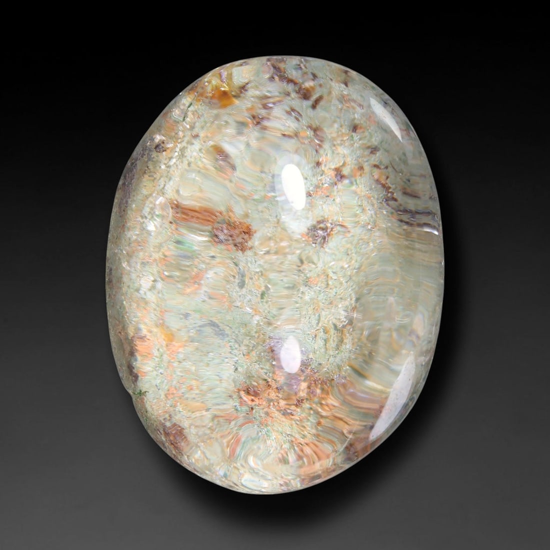 38.30ct Natural Brazilian Phantom Quartz Oval Cabochon Loose Gemstone, 37YX: This smoothly polished cabochon of natural phantom quartz preserves delicate layered phantom crystal formations enclosed inside transparent quartz host. The domed polished surface offers unobstructed 