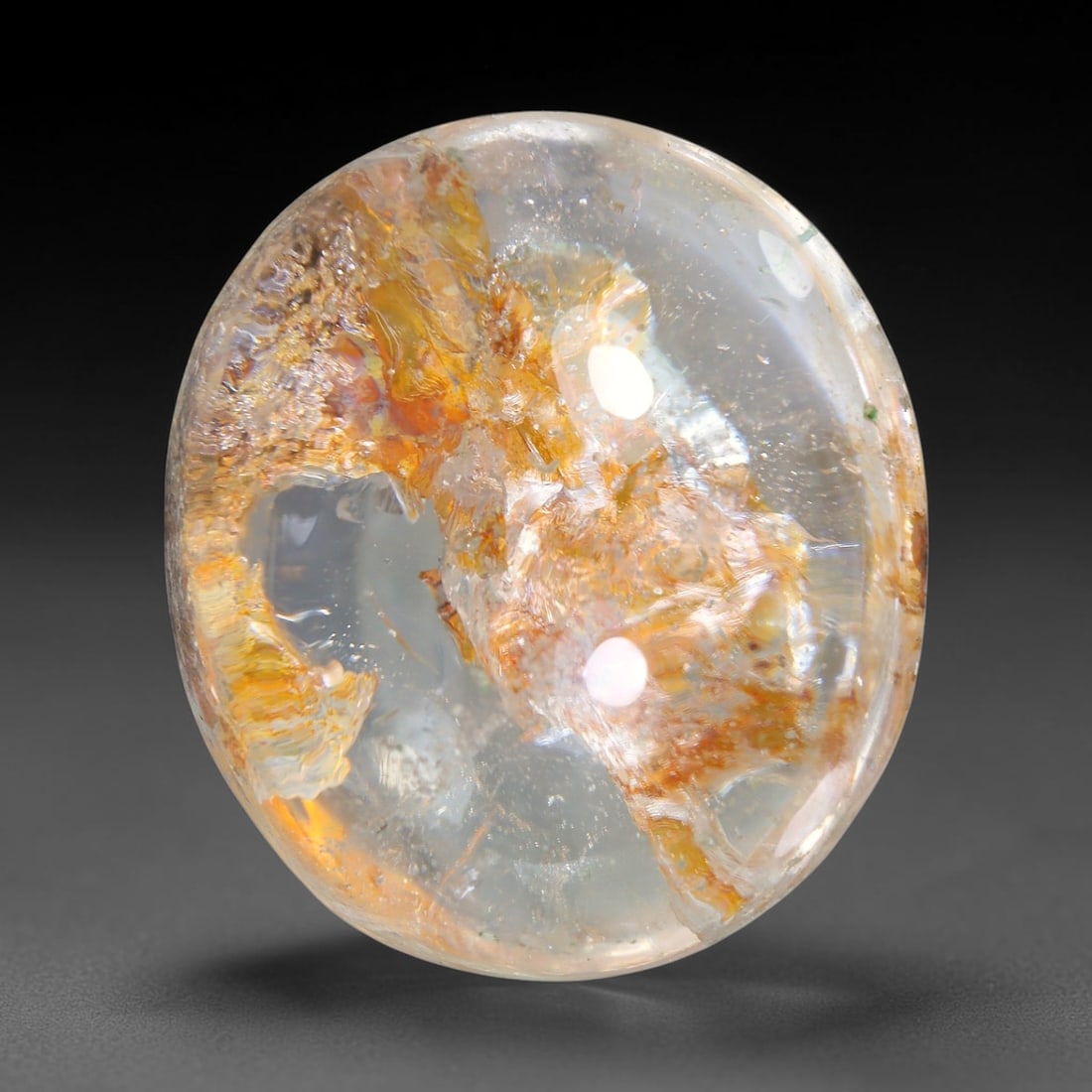 35.15ct Natural Brazilian Phantom Quartz Oval Cabochon Loose Gemstone, 55YX: This smoothly polished cabochon of natural phantom quartz preserves delicate layered phantom crystal formations enclosed inside transparent quartz host. The domed polished surface offers unobstructed 