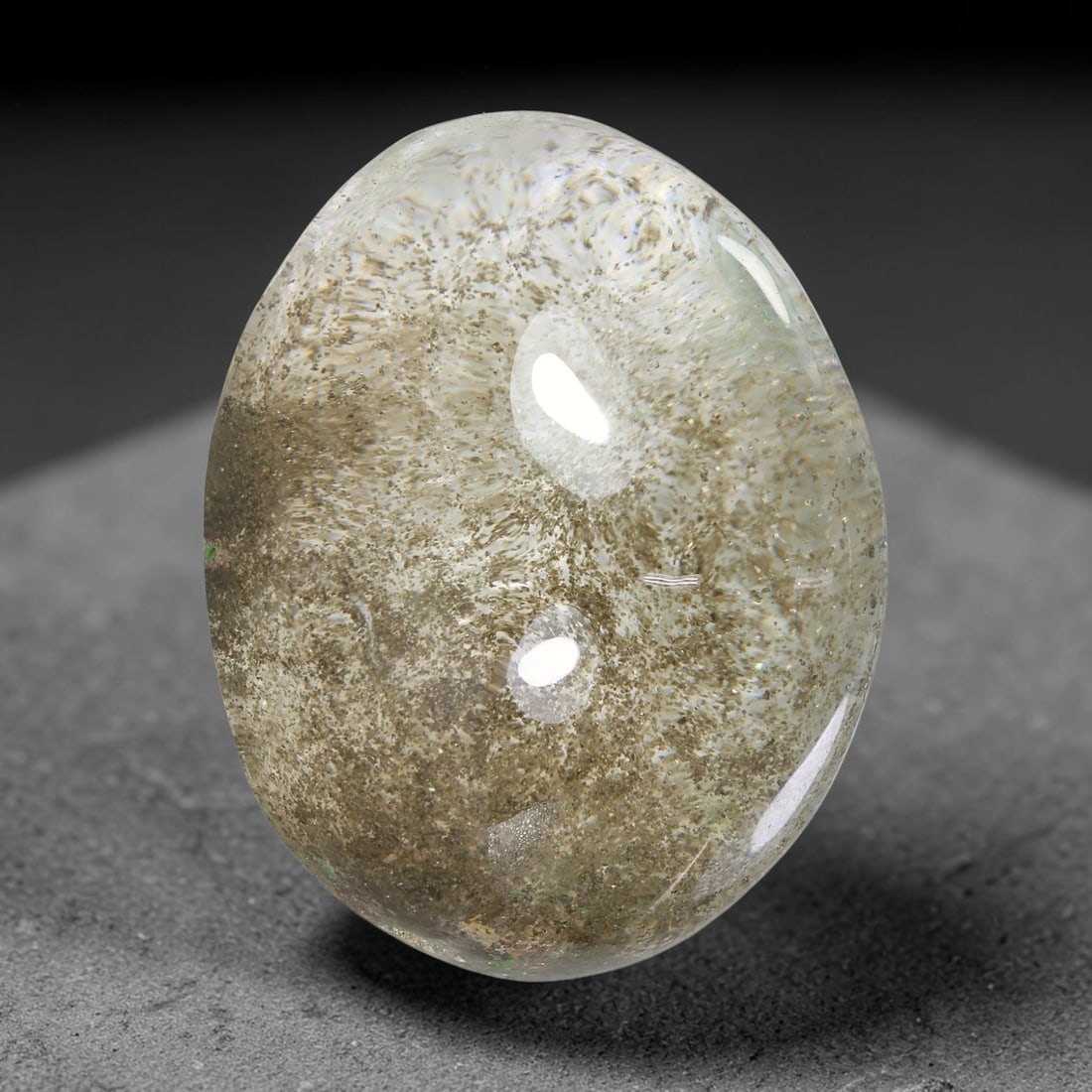 42.40ct Natural Brazilian Phantom Quartz Oval Cabochon Loose Gemstone, 31YX: This smoothly polished cabochon of natural phantom quartz preserves delicate layered phantom crystal formations enclosed inside transparent quartz host. The domed polished surface offers unobstructed 