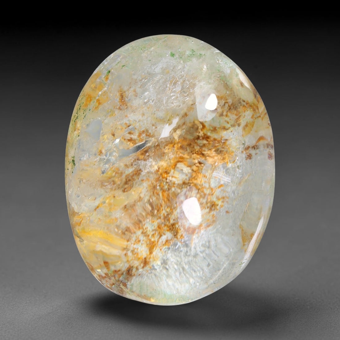 33.52ct Natural Brazilian Phantom Quartz Oval Cabochon Loose Gemstone, 45YX: This smoothly polished cabochon of natural phantom quartz preserves delicate layered phantom crystal formations enclosed inside transparent quartz host. The domed polished surface offers unobstructed 