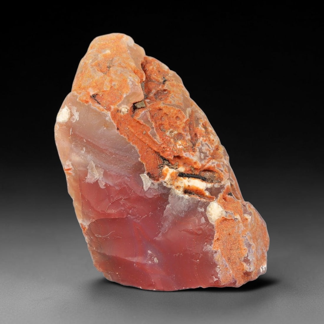 60g Natural Red Pink Agate Rough Loose Raw Gemstone Specimen, 58SB: This natural red pink agate rough weighs 60g, with dimensions 56.7x34.9x25.9mm. It features rich translucent red-pink core with natural orange host rock matrix, visible raw fractures and mineral depos