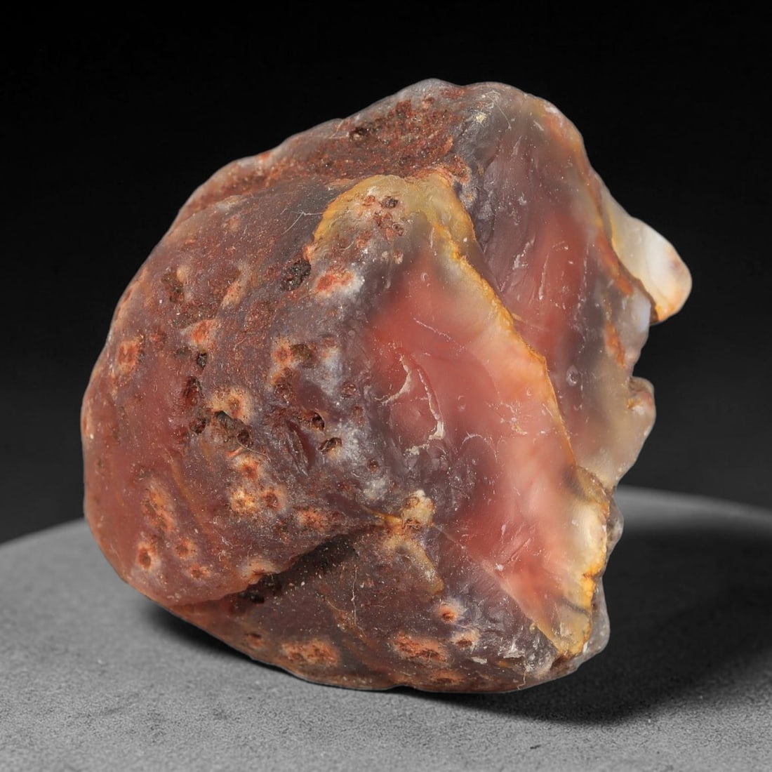 93g Natural Red Agate Rough Loose Raw Gemstone Specimen, 57SB: This natural red agate rough weighs 93g, measuring 48.6x42.7x38.6mm. It features deep reddish translucent agate dotted with small mineral inclusions, natural banding and rugged raw outer skin. Ideal f