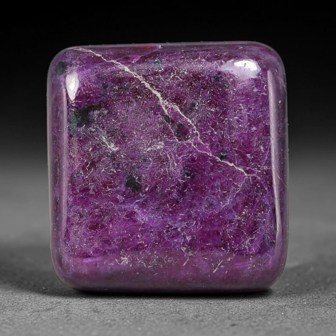 16.02ct Natural Ruby Zoisite Cabochon Loose Gemstone, 88TZ: Natural ruby zoisite cabochon cut, dimensions 15.6x14.9x4.6mm. Rich magenta and deep purple swirling colour pattern with natural mineral veining across the polished surface. Smooth polished cabochon f