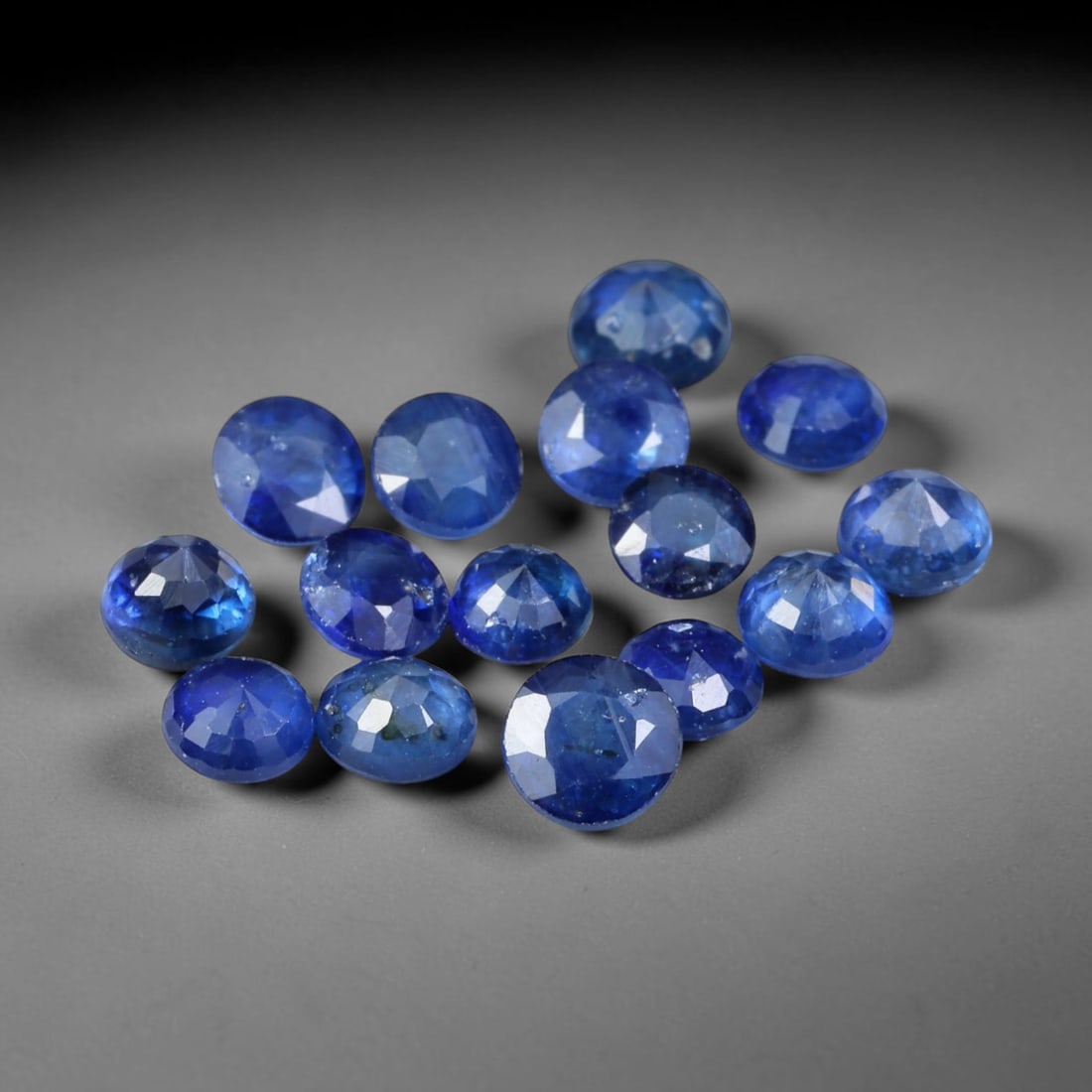 3.30ct Natural Blue Sapphire Round Cut Loose Gemstone Parcel, 17TZ: This parcel round faceted natural blue sapphires with each stone measuring 3.8x2.4mm. The gemstones show saturated deep blue colouration with natural mineral inclusions and subtle internal growth feat