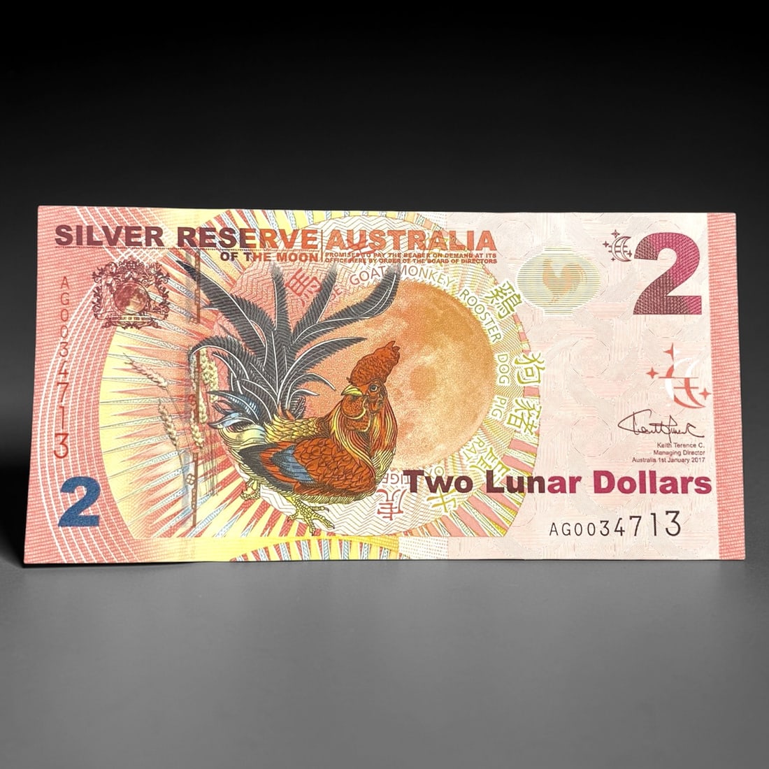AUSTRALIA: Lunar Zodiac - Year of the Rooster 2 Lunar Dollars Note, 2017, 4ZK: Issued in 2017 by the Silver Reserve of the Moon, Australia, this 2 Lunar Dollars note celebrates the Year of the Rooster in the Chinese zodiac, a symbol of confidence, vigilance, and good fortune. Th