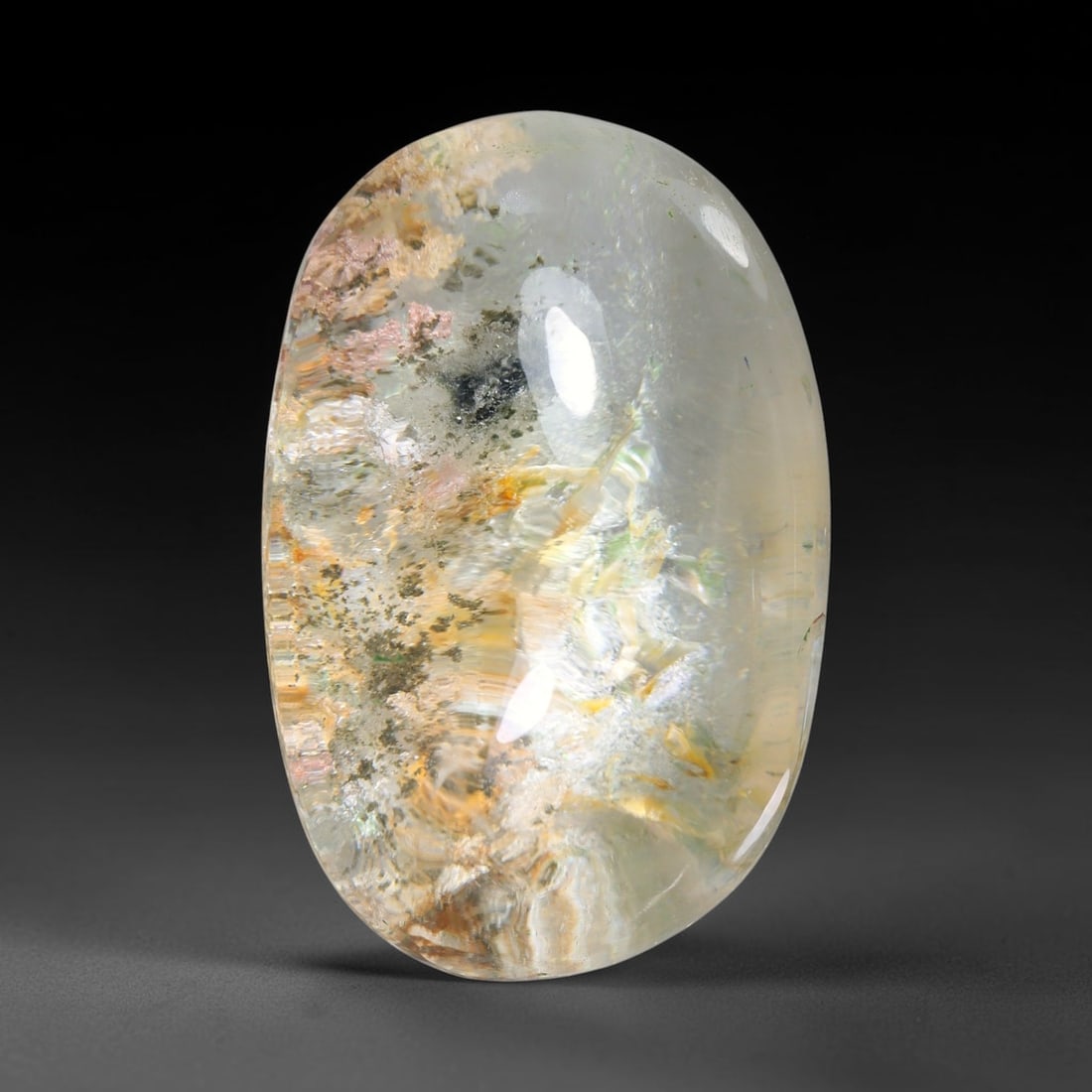 38.58ct Natural Brazilian Phantom Quartz Oval Cabochon Loose Gemstone, 22YX: This smoothly polished cabochon of natural phantom quartz preserves delicate layered phantom crystal formations enclosed inside transparent quartz host. The domed polished surface offers unobstructed 