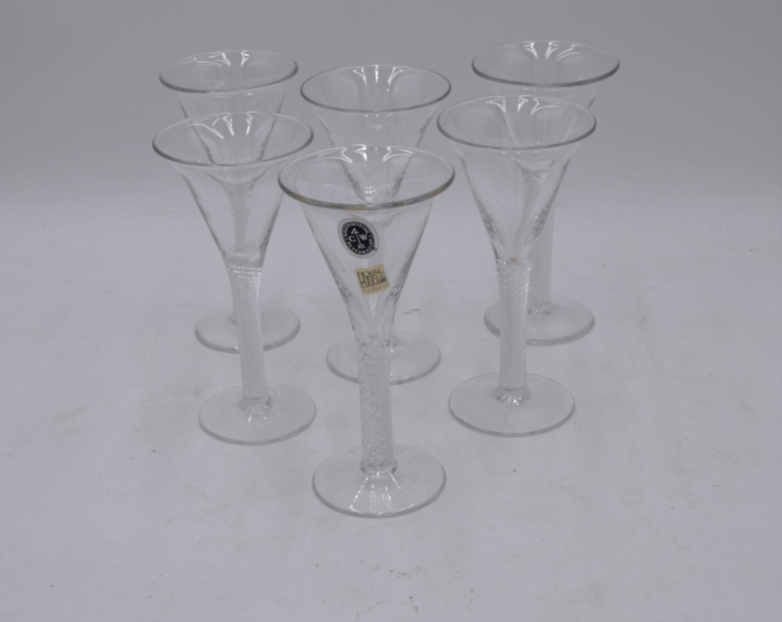 Set of 6 CW-3 Air Twist Wine Glasses Stemware: Hand-formed, mouth-blown lead glass stemware. Spiral air-twist form was developed in the 18th Century. In making this stemware, a wire is introduced into the molten stem to form a channel. Several cha