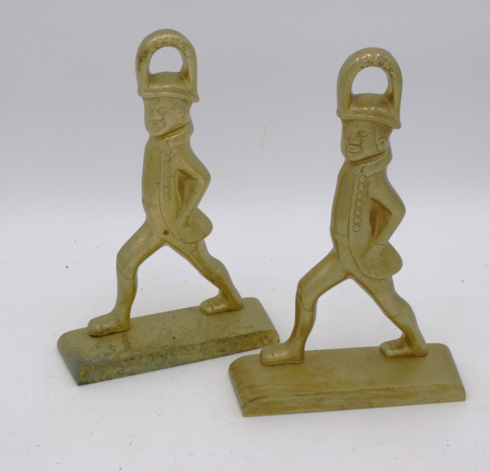 Pair of VA Metalcrafters Colonial Williamsburg Striding Man Doorstops CW-65: striding man brass doorstop or bookends. The originals are part of the Williamsburg American Folk Art Collection