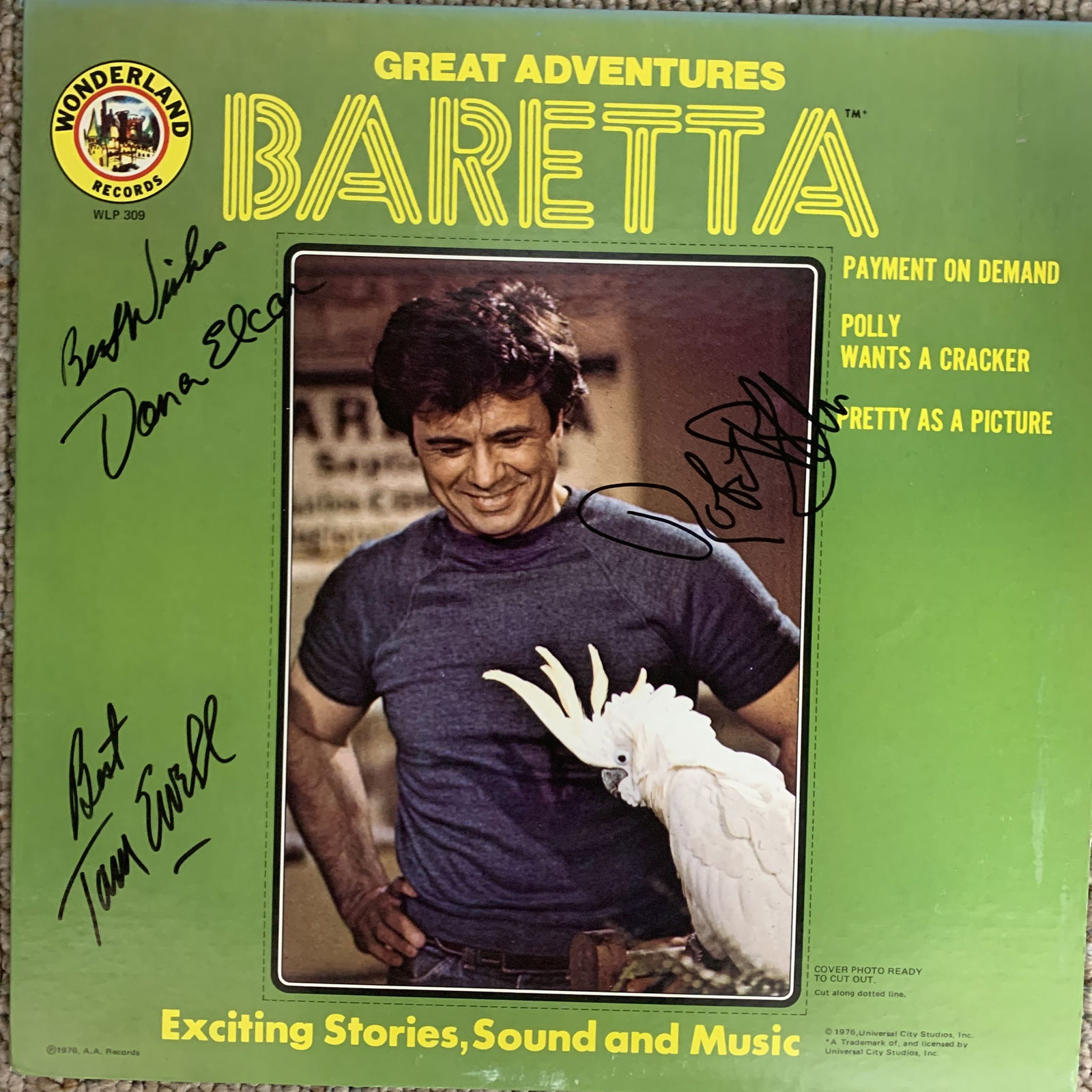 Baretta Great Adventures signed album. GFA Authenticated: Baretta Great Adventures signed album autographed by Robert Blake, Dana Elcor and Tom Ewell. GFA Authenticated
