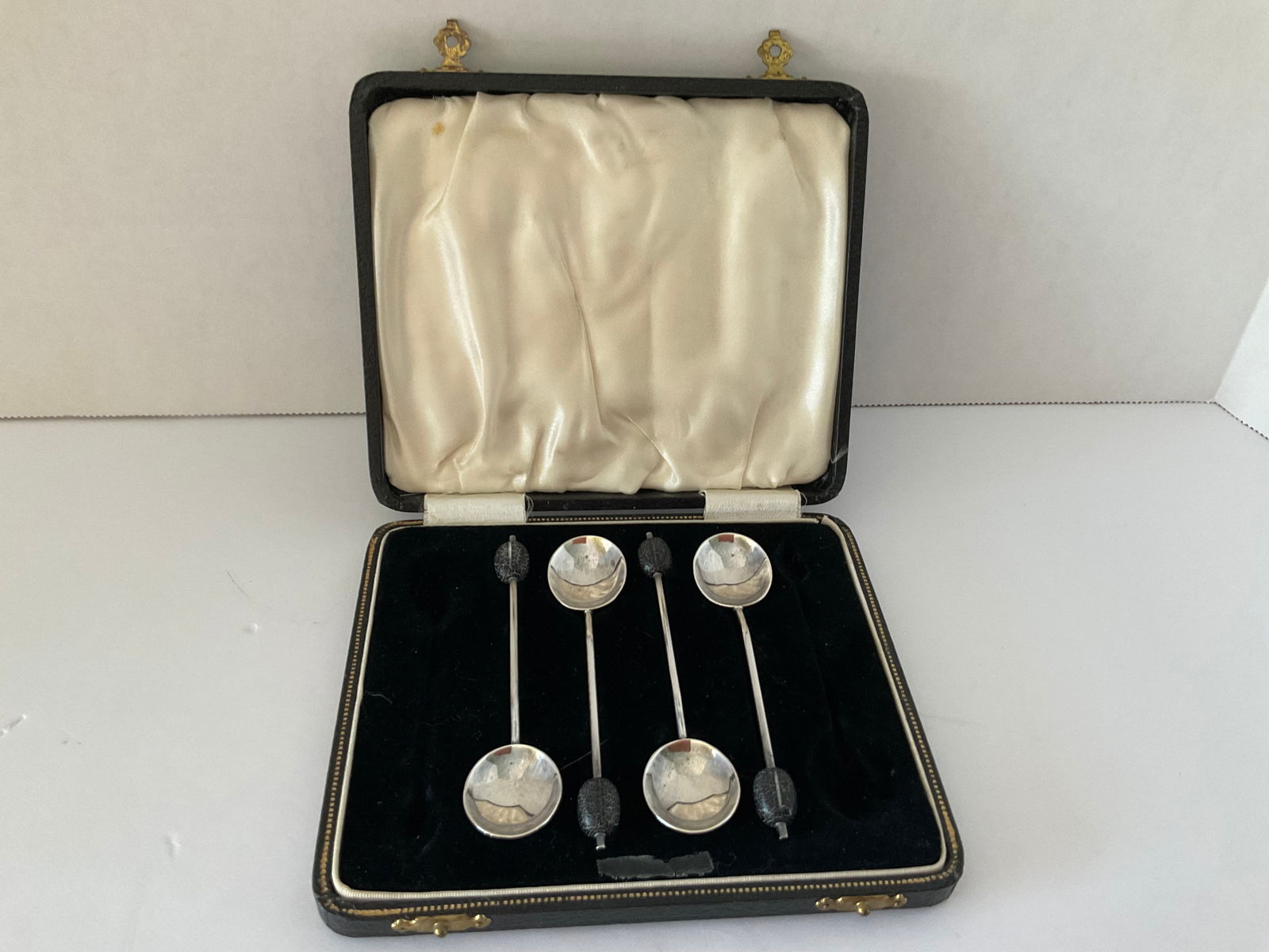 Four Sterling Arthur Price & Co Demitasse Spoons with Coffee Bean Accents: Included is the original box which originally held six spoons. Made in 1936 by the Arthur Price & Co of Birmingham. Four 4 inch spoons are included with a crackle finish coffee bean affixed to the end