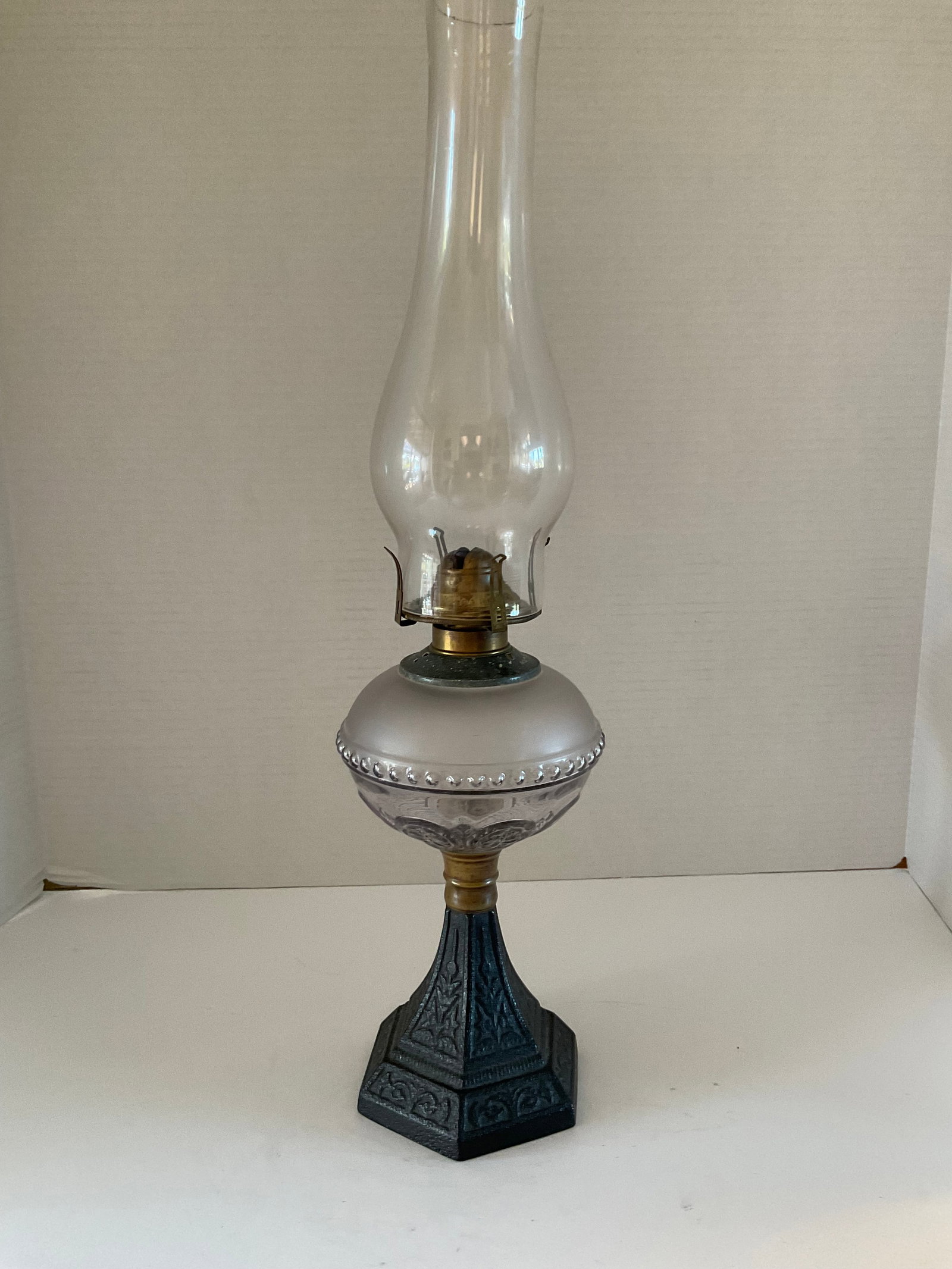 Antique Hurricane Lamp with Lavender Glass: Beautiful example of an early American Victorian era hurricane lamp. The glass oil bowl is a lovely lavender color and is fairly small, could have been for whale oil. Good condition, untested. It meas