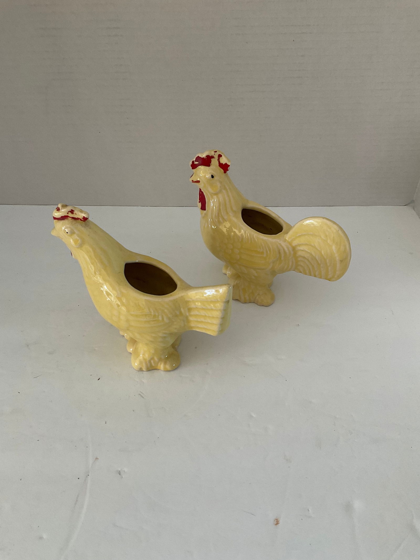 Pair of Vintage Chicken Vases: A pair of vintage ceramic chicken vases. Very cute, but some red paint loss and a chip to the top of one. Please see photos. Each is 5" x 6" approximately.