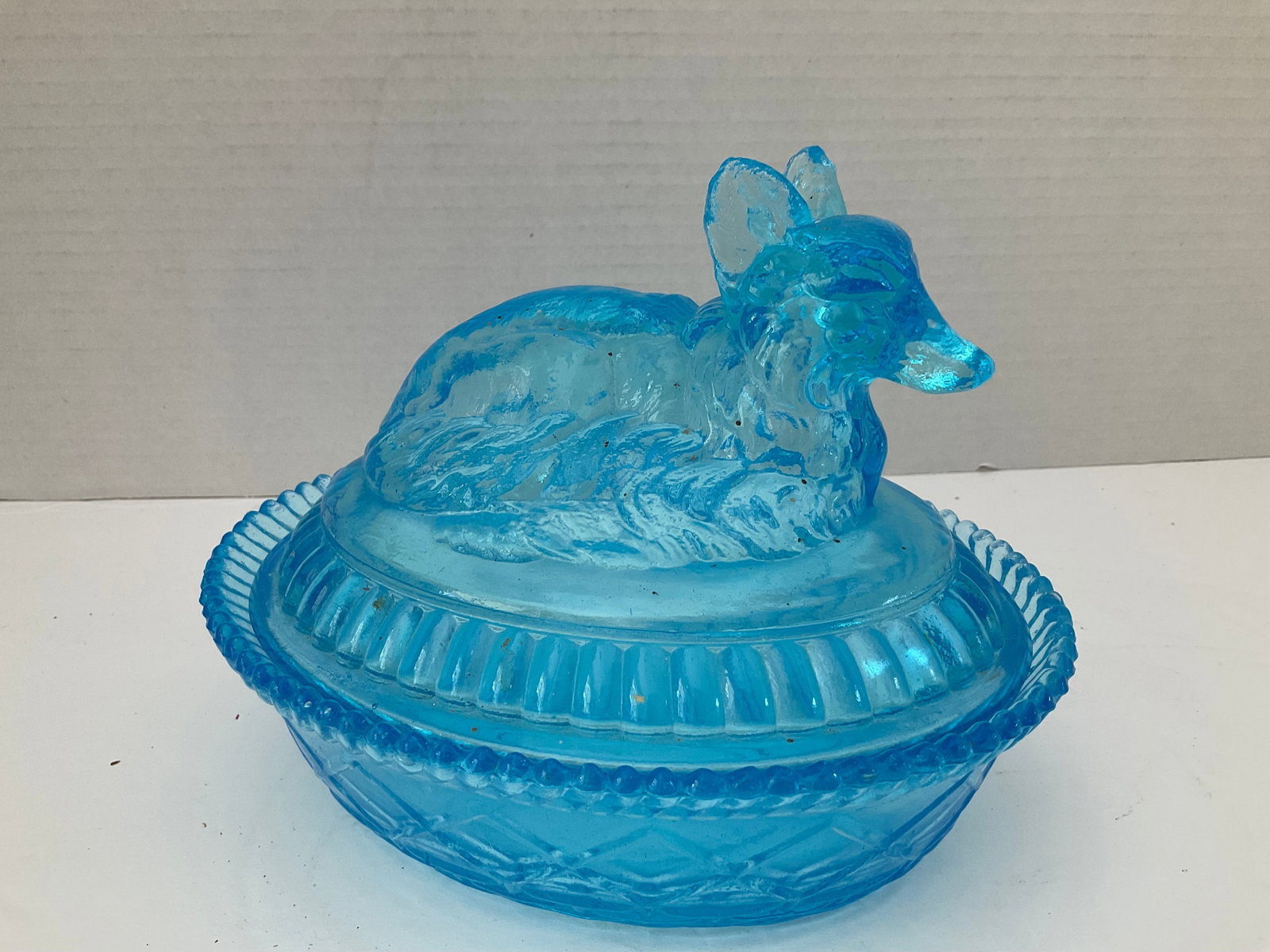 Rare Kemple Fox on Nest in Blue 1950's: A rare Kemple blue glass fox on nest candy dish. It is in very good conditiion with a small flea bite on one ear. It measures 7 x 6 x 6 approximately. Please see photos. Raised "K" backstamp.