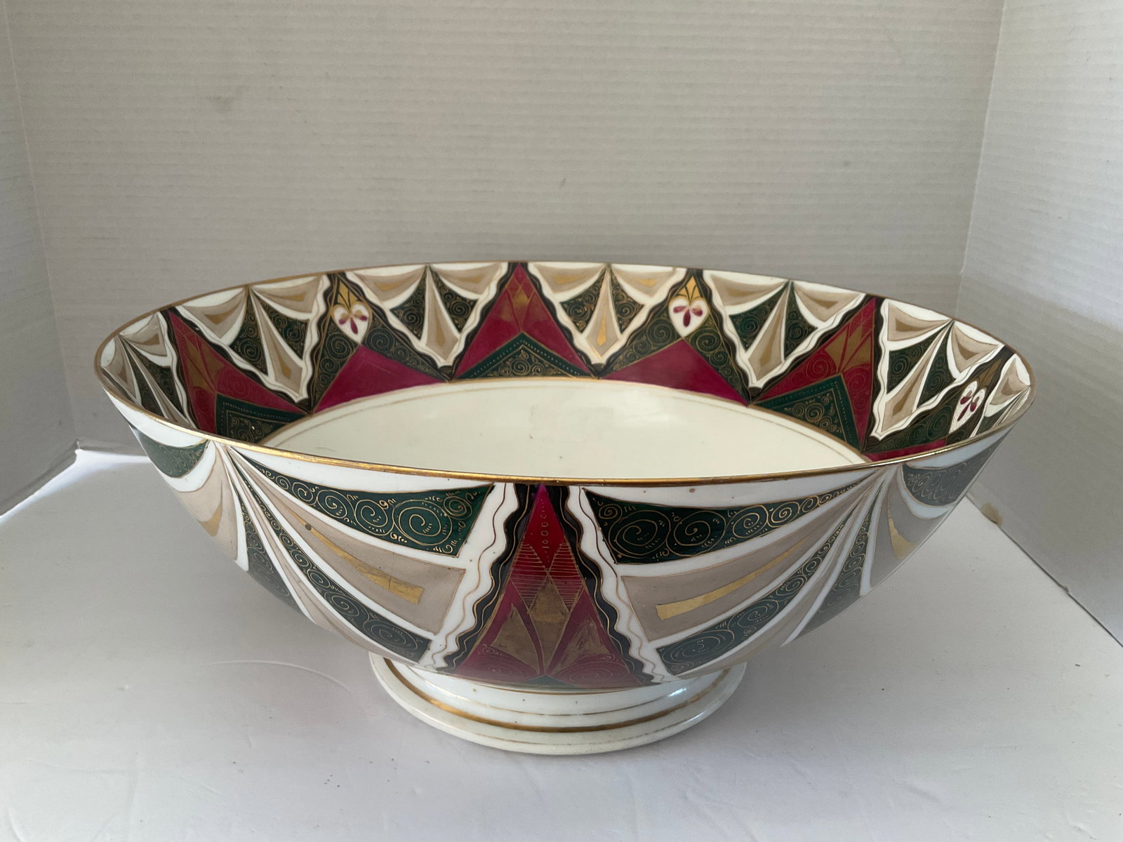 Antique C.F. Boseck Huge Centerpiece Bowl: A beautiful huge porcelain centerpiece bowl by C.F. Boseck bowl. Made in Austria and clearly stamped to the base. It measures 6" high and 15" in diameter. Unusual burgundy and forest green colors with
