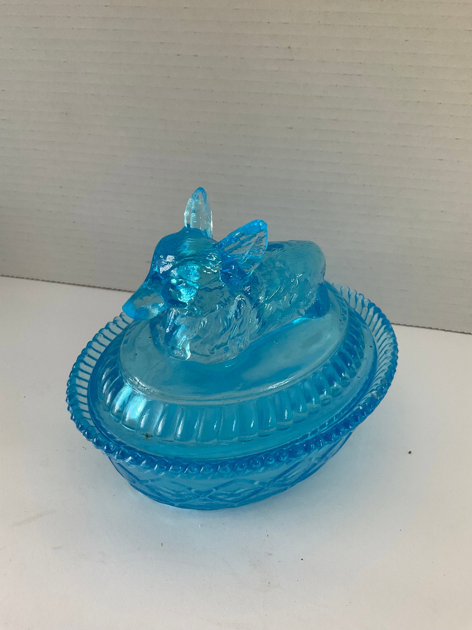 Rare Blue Glass Kemble Fox on Nest: A rare blue vintage Kemple Fox on nest. This piece is a generous size measuring 6"h x 8" x 4"