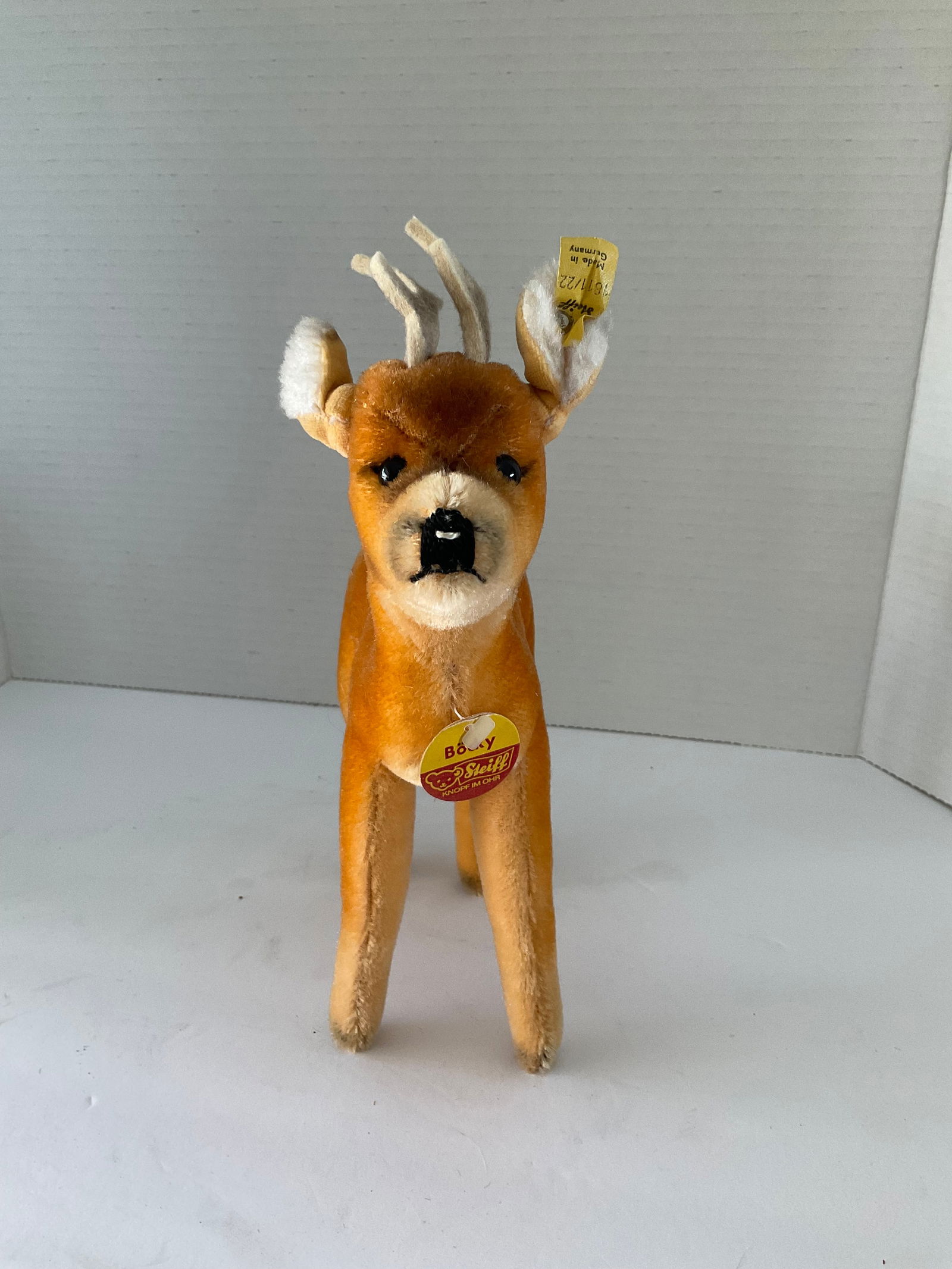 Antique Steiff "Bocky" Deer: An antique "Bocky" deer. Complete with name tag, ear tag and button. He measures 10"h x 7" x 3".