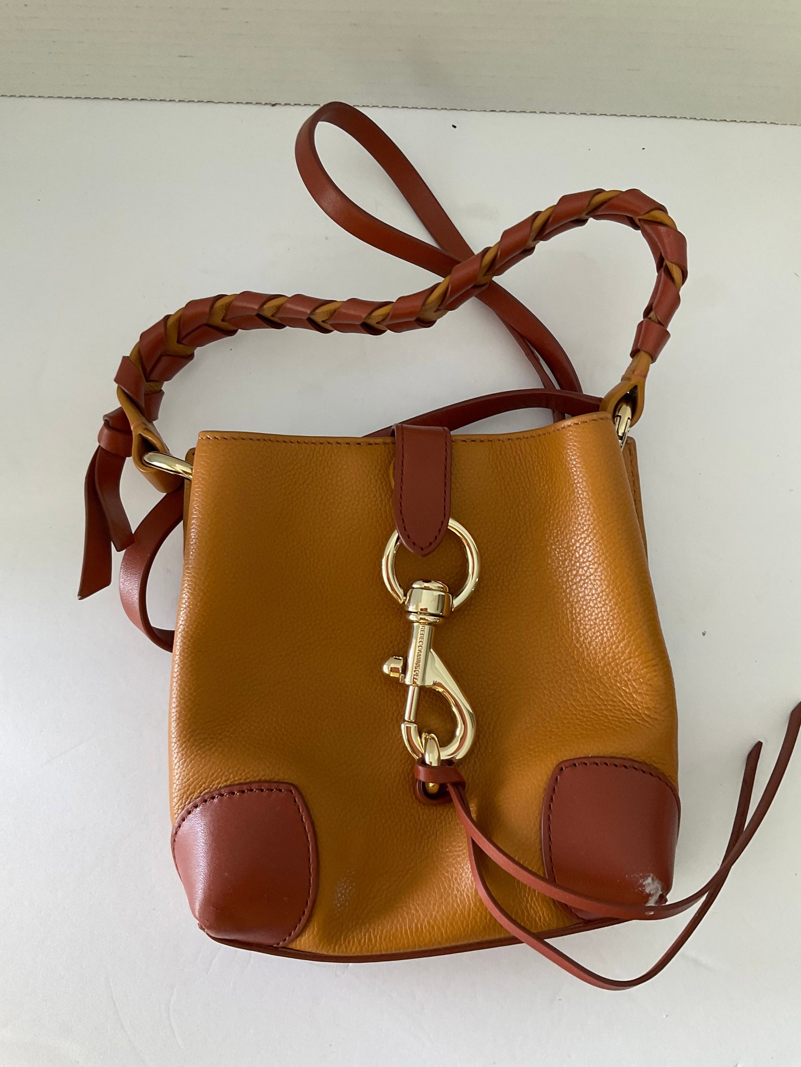 Rebecca Minkoff All Leather Crossbody: A Rebecca Minkoff all leather, inside and out crossbody with solid brass hardware. Purse is 7 x 7"