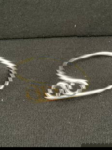 Handmade Sterling (?) Adjustable Bangle: A handmade adjustable unmarked sterling (does not react with magnet) bracelet. It is 22.8 grams