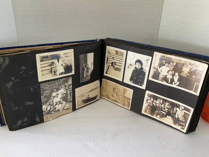 Vintage Photo Album from 1940's and Before: A collection of black and white photos from 1940's and before. Over thirty pages of multiple photos. It is 2"thick and measures 11 x 7".