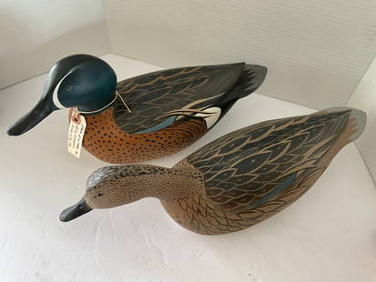 Pair of Carved Decoys signed by Bill Goenne of King City, CA: A pair of Blue Wing Teal Duck decoys by Bill Goenne of King City, CA. Beautifully painted and carved. Please see photos. Each measures approximately 15" x 8" x 8". Made to be working decoys, but they