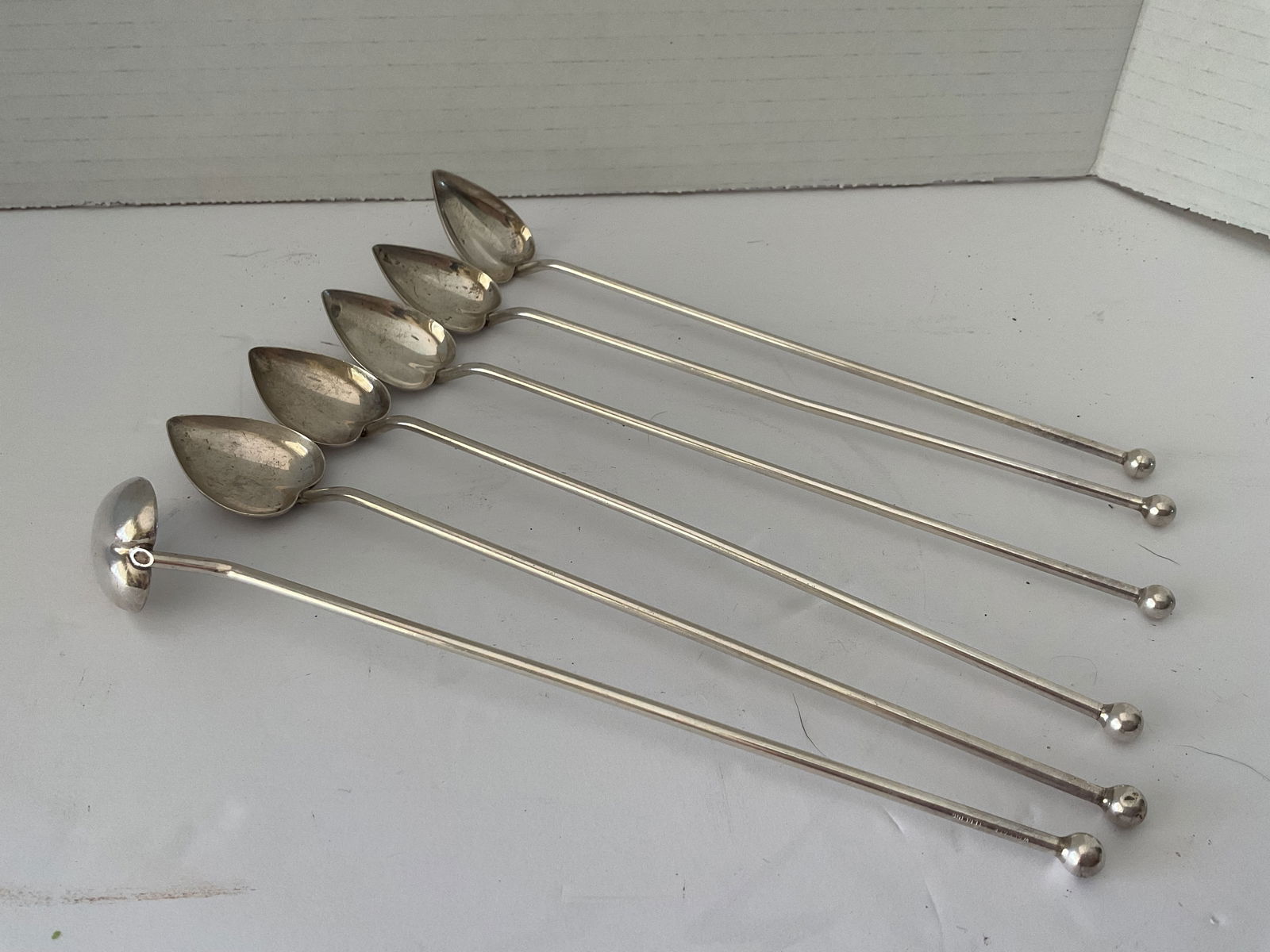 Collection of Six Vintage Wallace Iced Tea Spoons: A Collection of Six Vintage heart shaped iced tea spoons from Wallace Silversmiths. Each spoon is 8" in length. Faintly stamped Sterling.