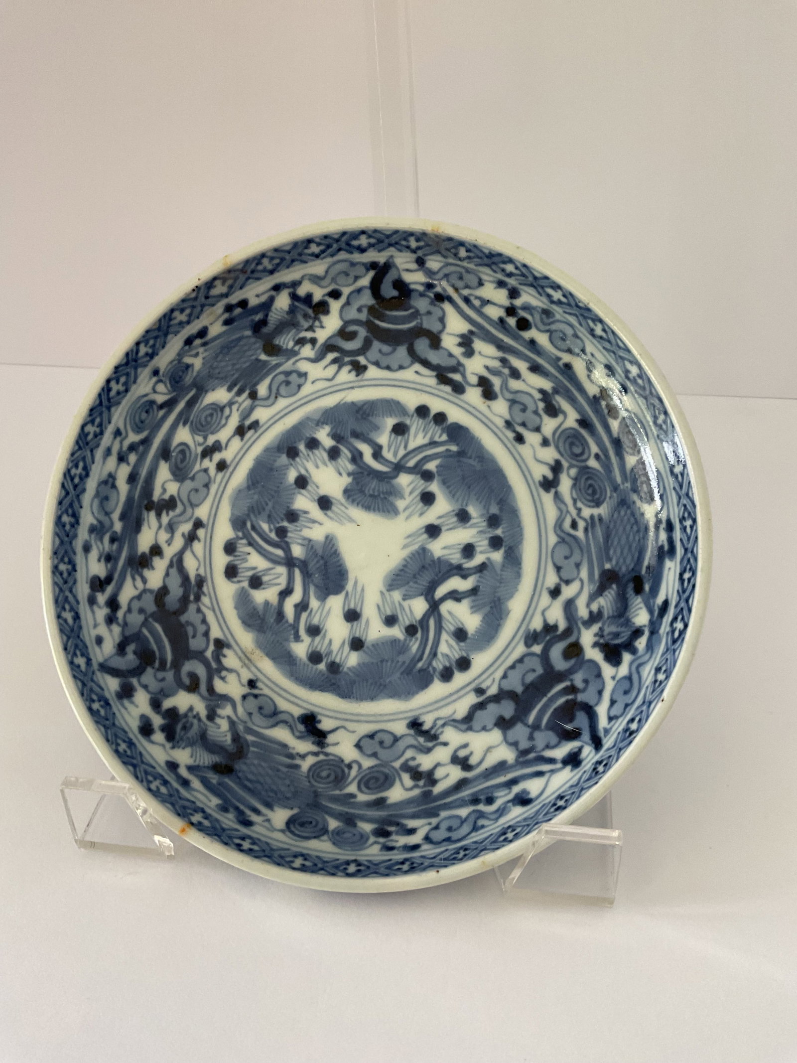 18th Century Japanese Bowl with Phoenix and Floal Motifs: 18th century Japanese bowl copy of Kangxi. It is circa 1740-1780. It measures just over 7" in diameter and 1.5" in height. Please see photos - lovely phoenix and floral motifs.