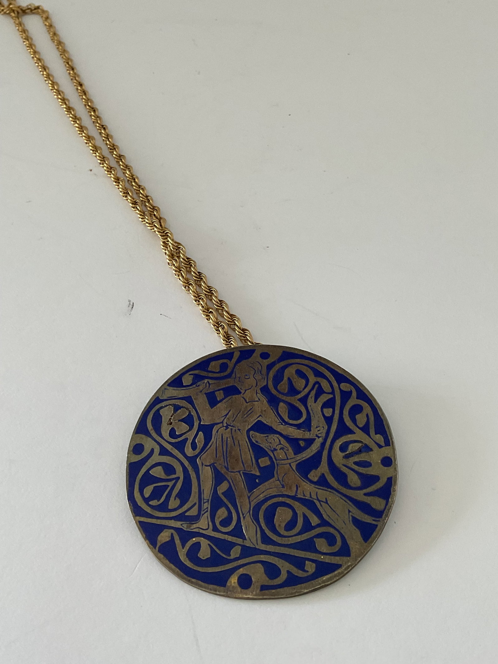 Medieval Huntsman French Limoges Pendant/Brooch: An enamel French Limoges adaptation from a group of French enamel rondels. Aquired from the Metropolitan Museum of Art with Information tag. Appears to be made of brass. See photos. Rondel is a large 