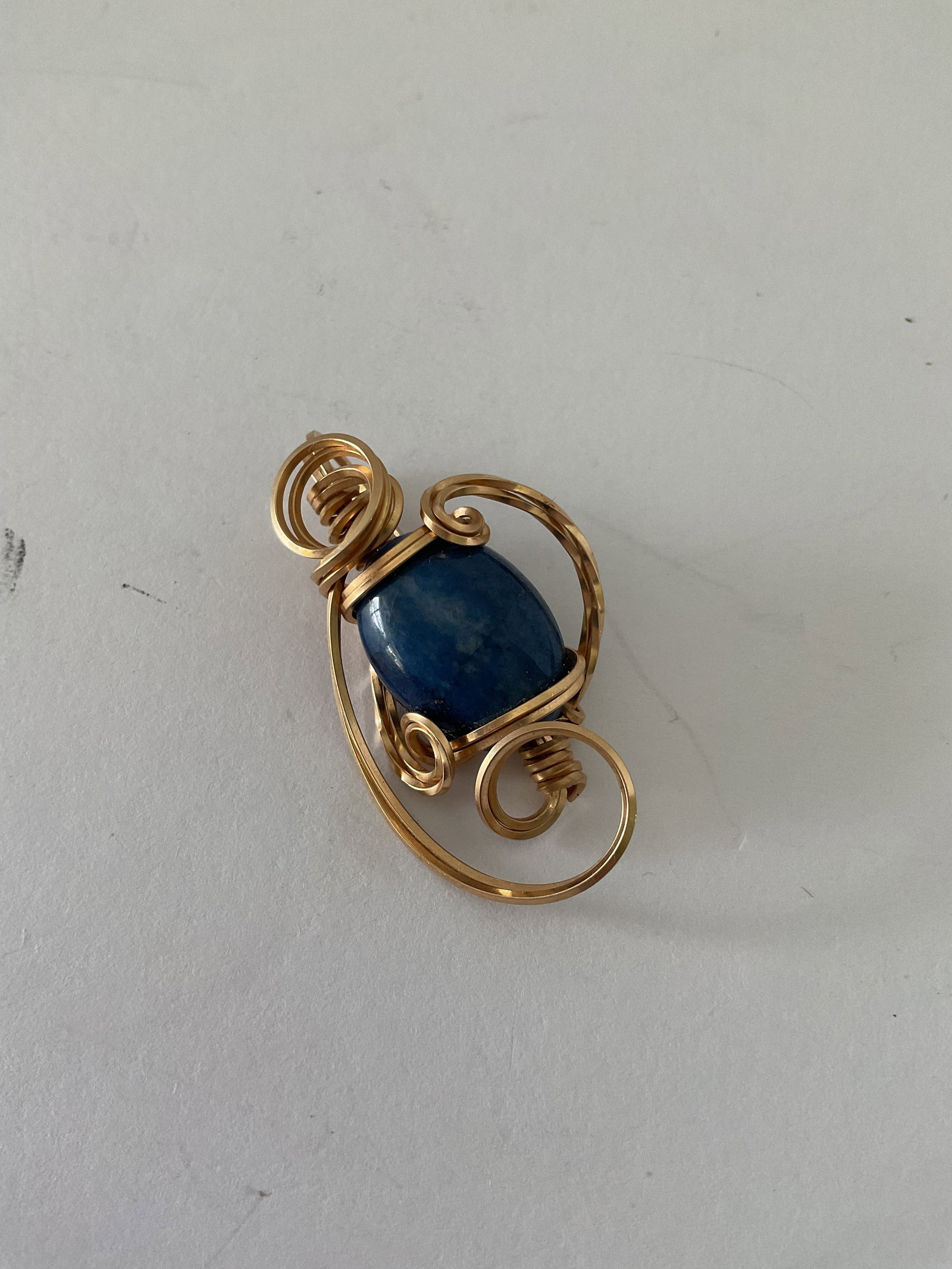 Handcrafted Tested 14K Yellow Gold and Lapis Pendant: A handcrafted 14K gold and lapis pendant. This piece is 1.5 x 1", weight is 5.6 grams inclusive of stones.