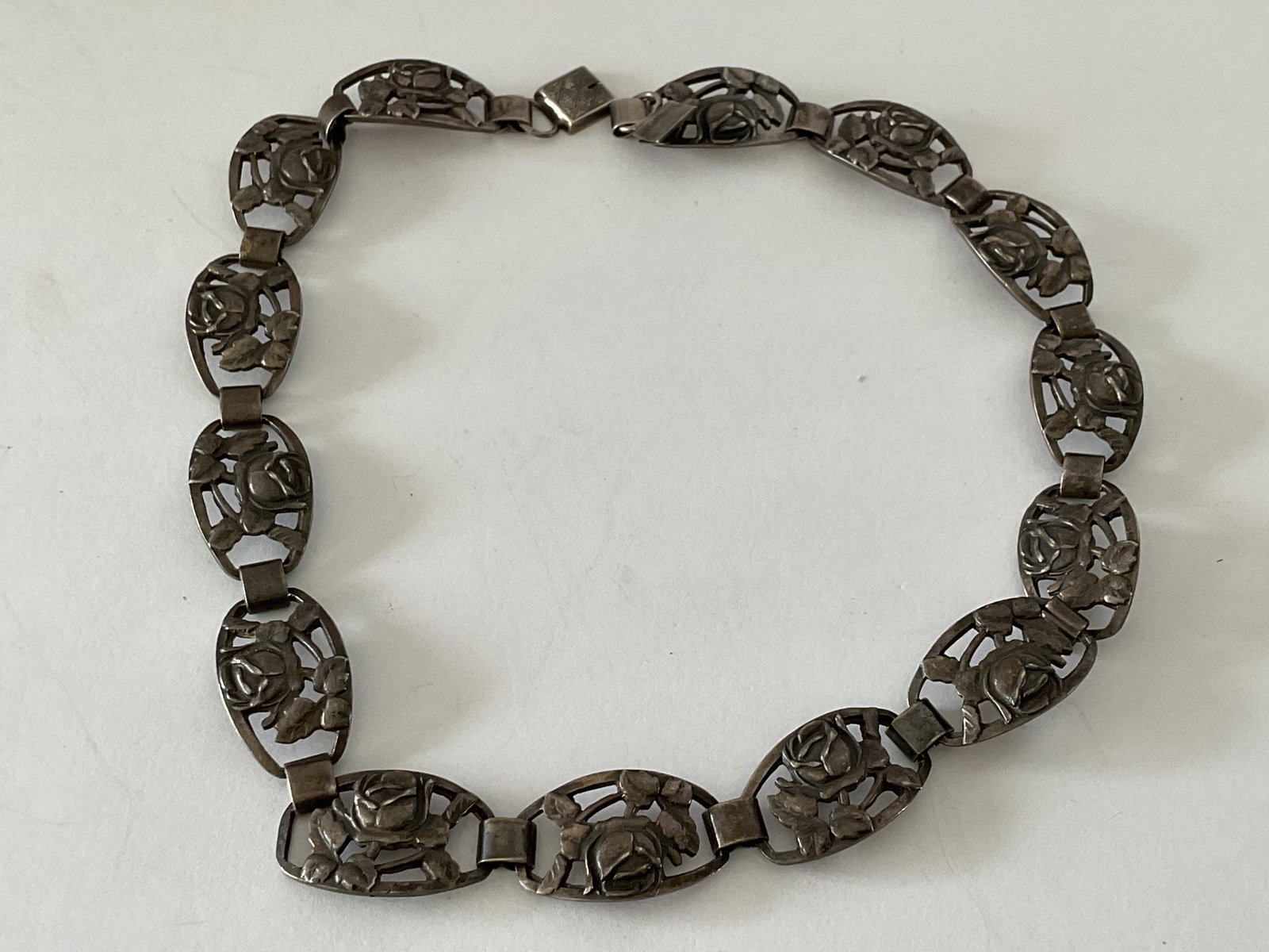 Signed and Stamped 925 Vintage Danish Necklace: A mid century signed Danish necklace with a rose motif. This piece is 15.5" in length and weight is 50.3 grams.