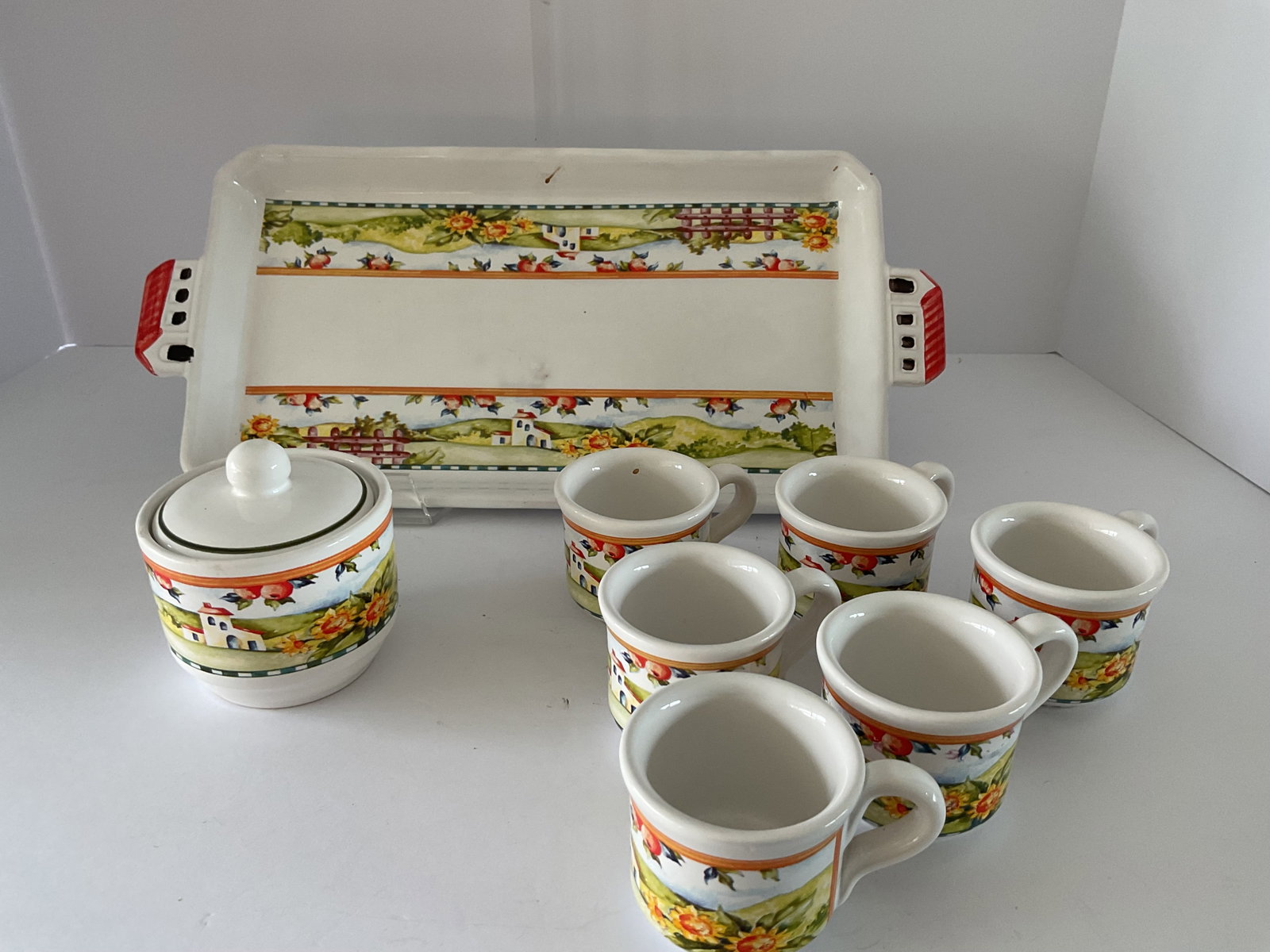 Tiriduzzi Deruta Ceramic Espresso Set with Tray: A Tiriduzzi Deruta ceramic espresso set. Included are six cups, sugar bowl and matching tray. Tray is 16 x 7”.