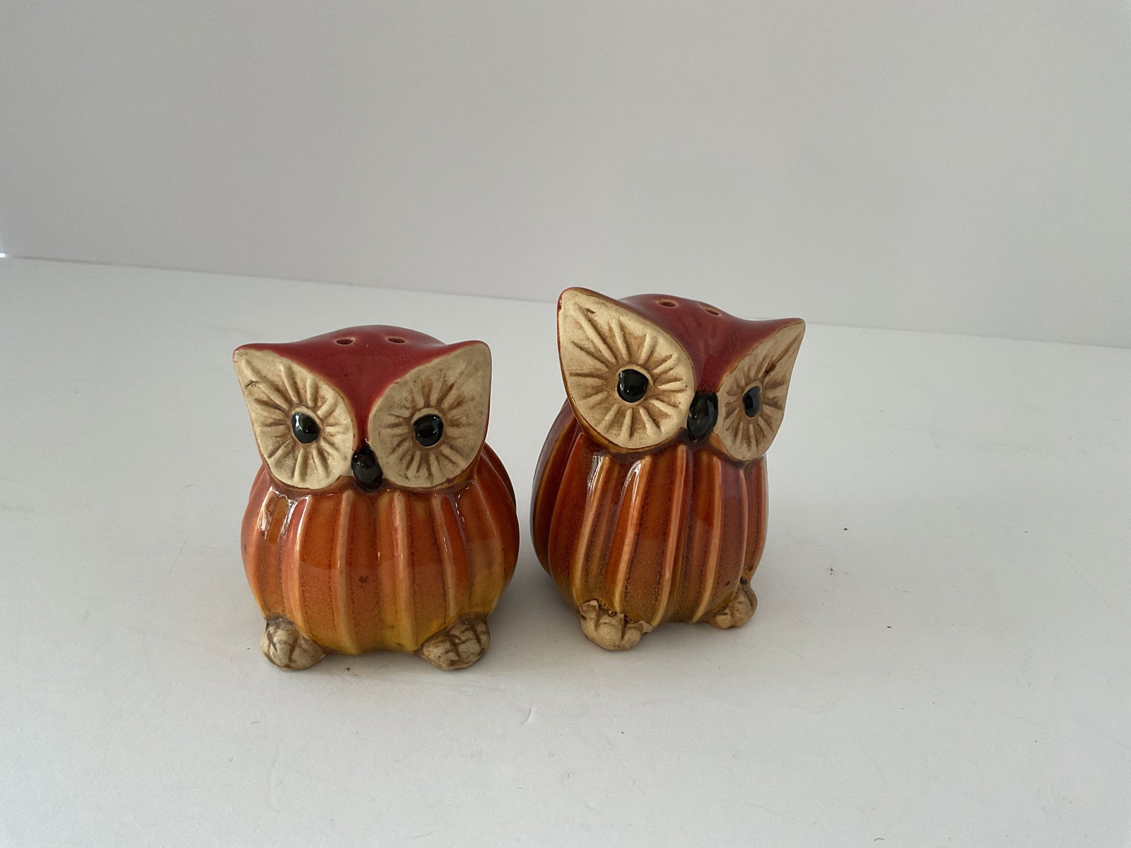 Adorable Mid Century Owl Salt & Pepper Set: An adorable mid century, most likely 70’s owl ceramic salt and pepper set. Each is approximately 3” x 3”.