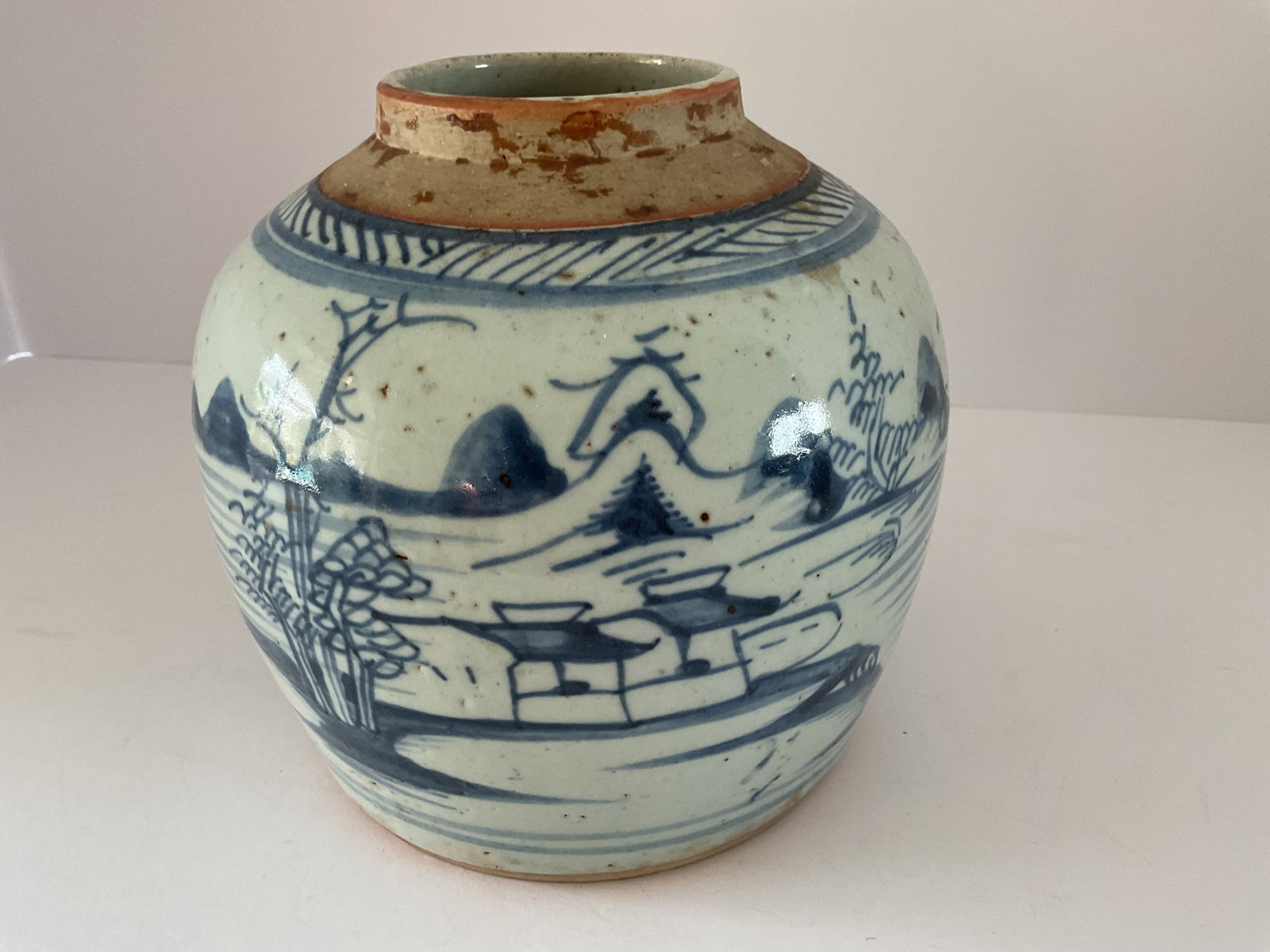 Antique Asian Ginger Jar: An antique pottery ginger jar. It measures 6 x 6”. No lid, no markings