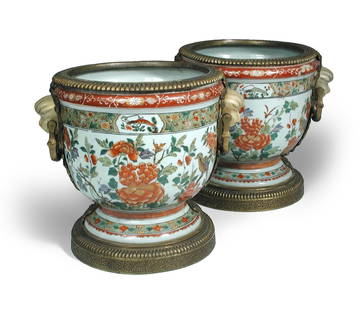 A Pair of Painted Porcelain Jars: H: 26cm W: 29cm
